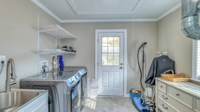 a kitchen with a sink stove and refrigerator