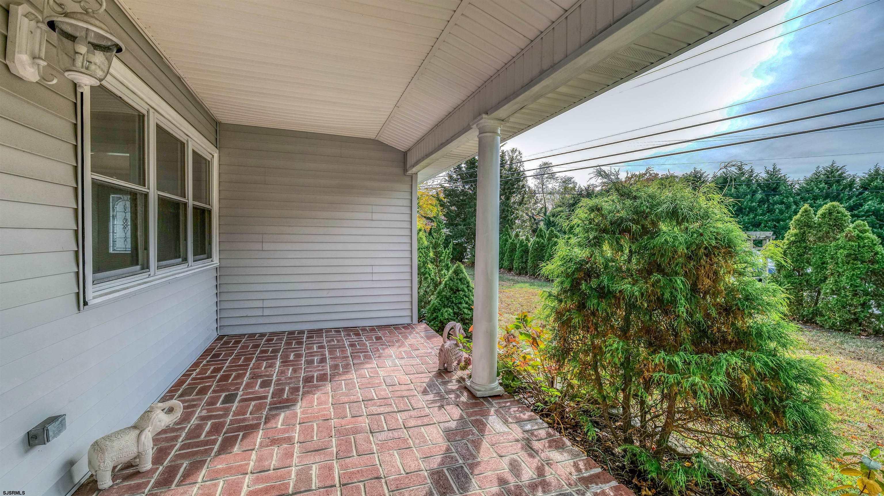 906 New Road Somers Point, NJ 08244 - Photo 3 of 32 a view of a back yard from a window