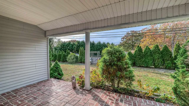 a house view with a garden space
