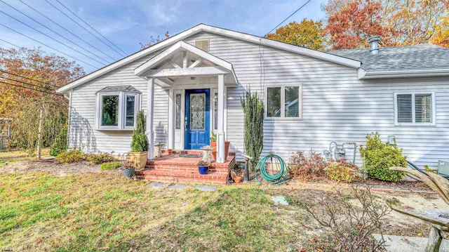 a front view of a house with patio