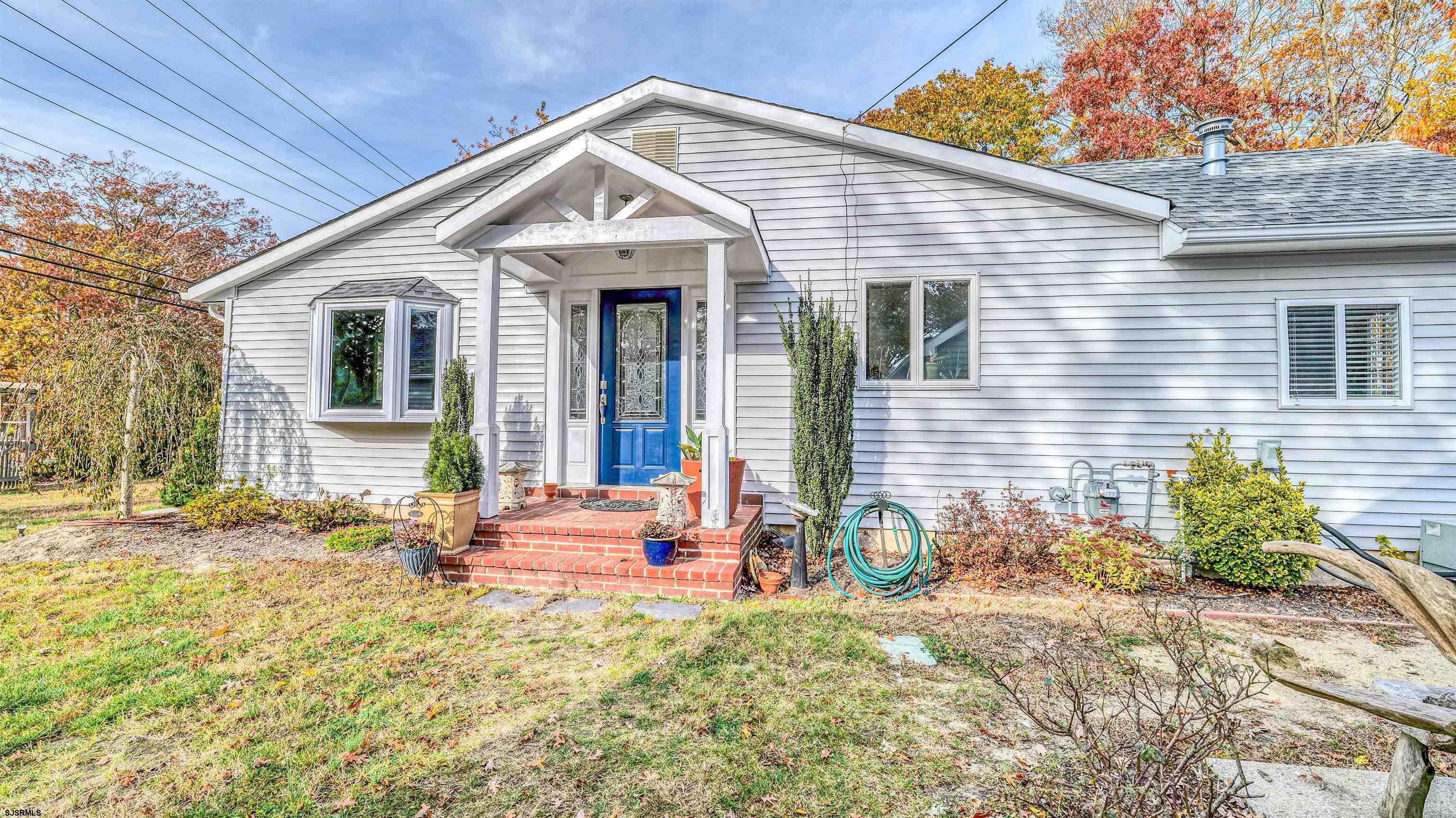 906 New Road Somers Point, NJ 08244 - Photo 8 of 32 a front view of a house with patio