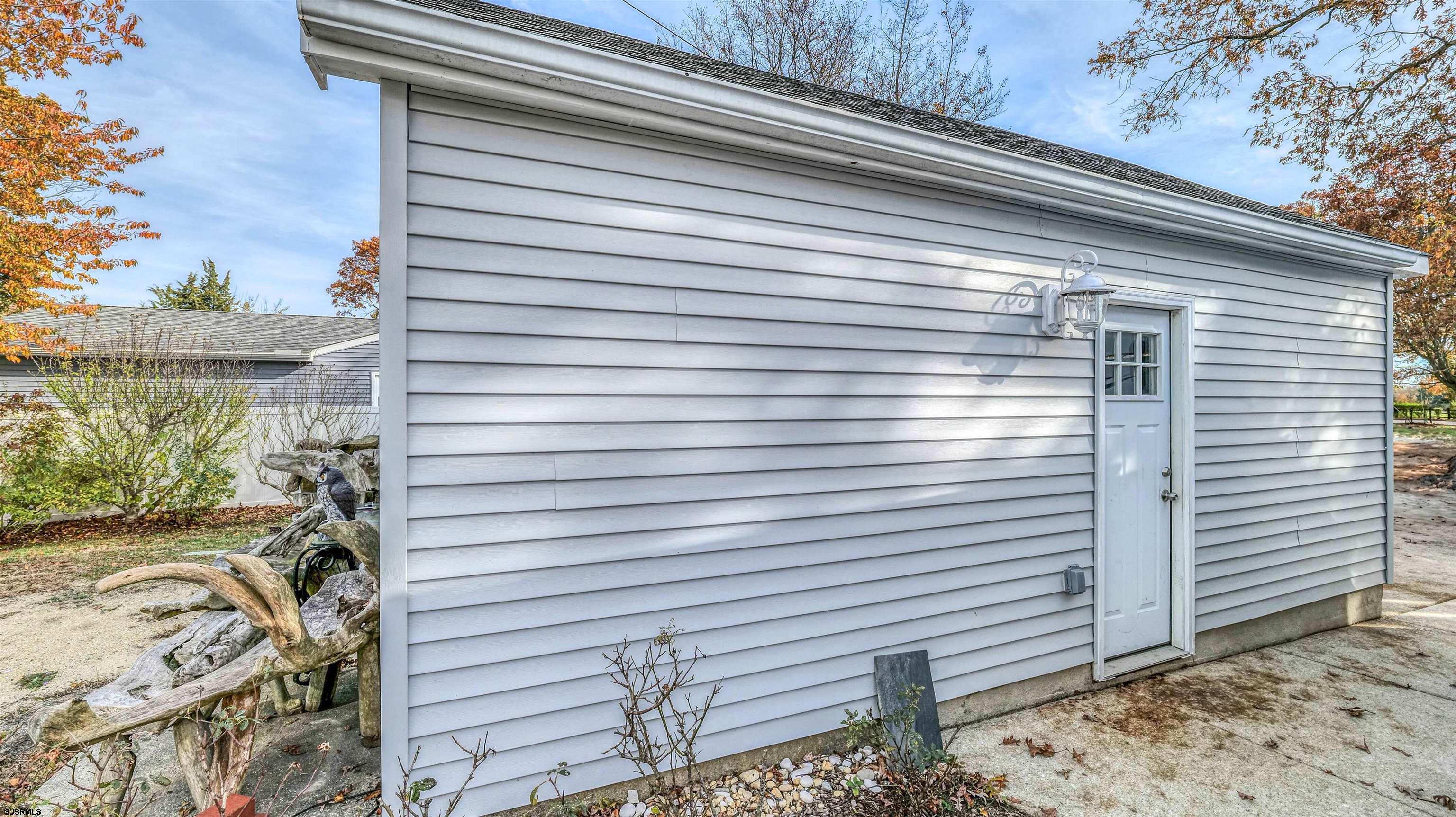 906 New Road Somers Point, NJ 08244 - Photo 9 of 32 a view of a house with a balcony