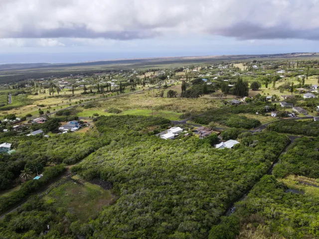 a view of a city with an ocean