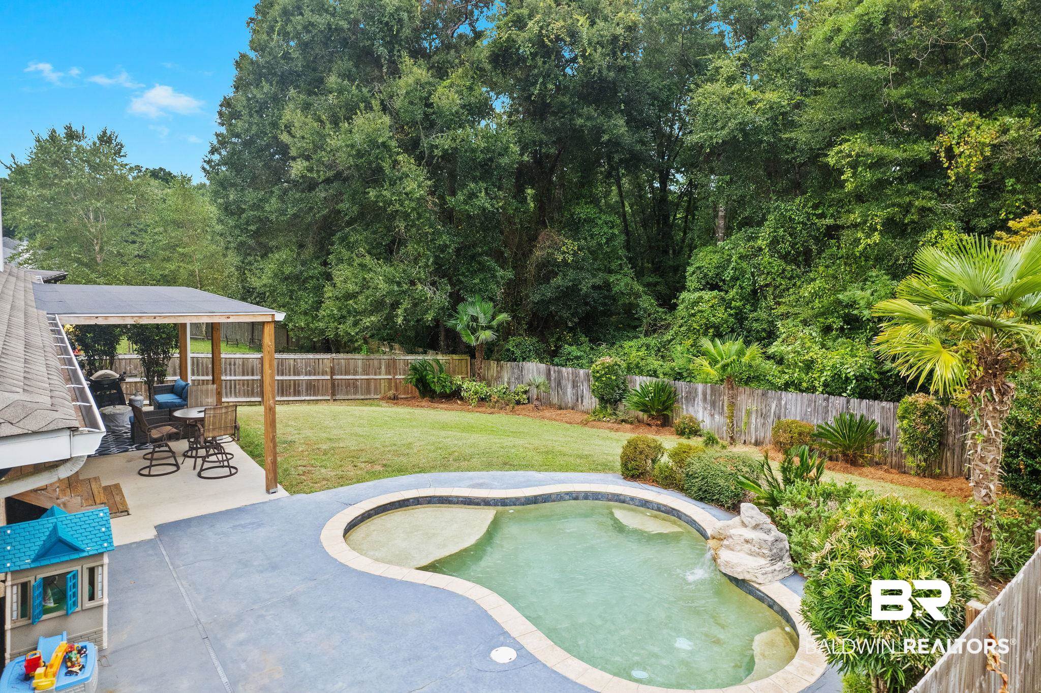 28246 Turkey Branch Drive Daphne, AL 36526 - Photo 31 of 41 View of swimming pool featuring a patio area, a gazebo, and a yard