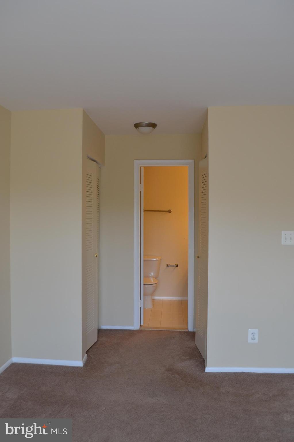 1704 Ascot Way, Unit F Reston, VA 20190 - Photo 10 of 18 Master bedroom ensuite bathroom and two closets