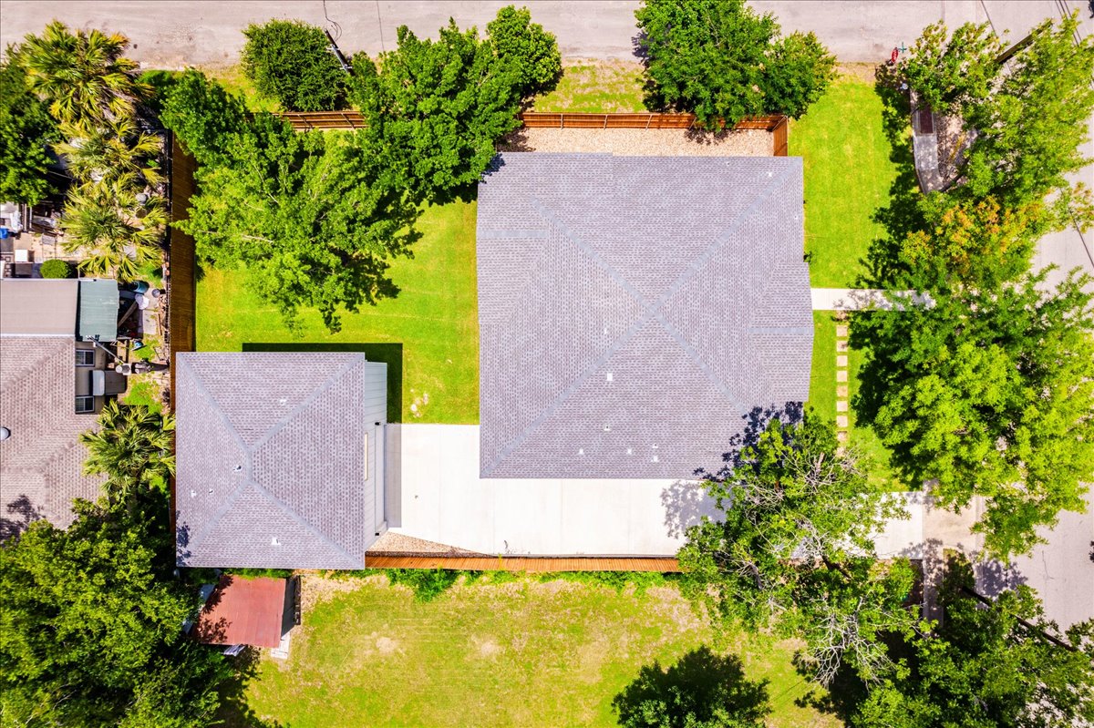1215 Howard Street Taylor, TX 76574 - Photo 35 of 37 an aerial view of a house with swimming pool and garden