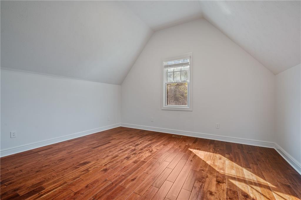 1759 Parkview Boulevard Pittsburgh, PA 15217 - Photo 37 of 45 an empty room with wooden floor and windows