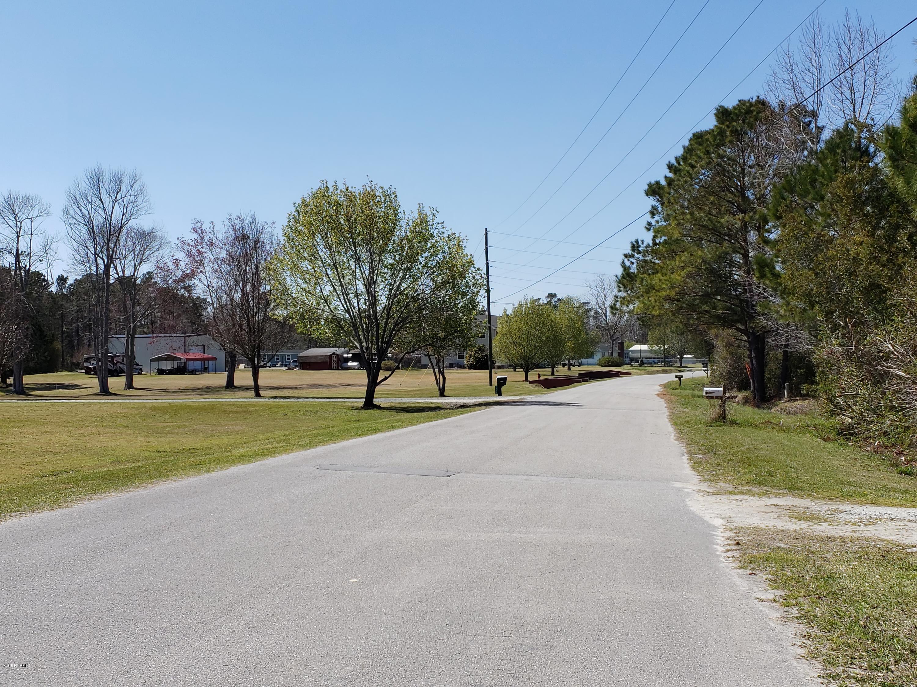 1157 South Parker Road Holly Ridge, NC 28445 - Photo 2 of 57 Roadway going back out of the neighborhood.