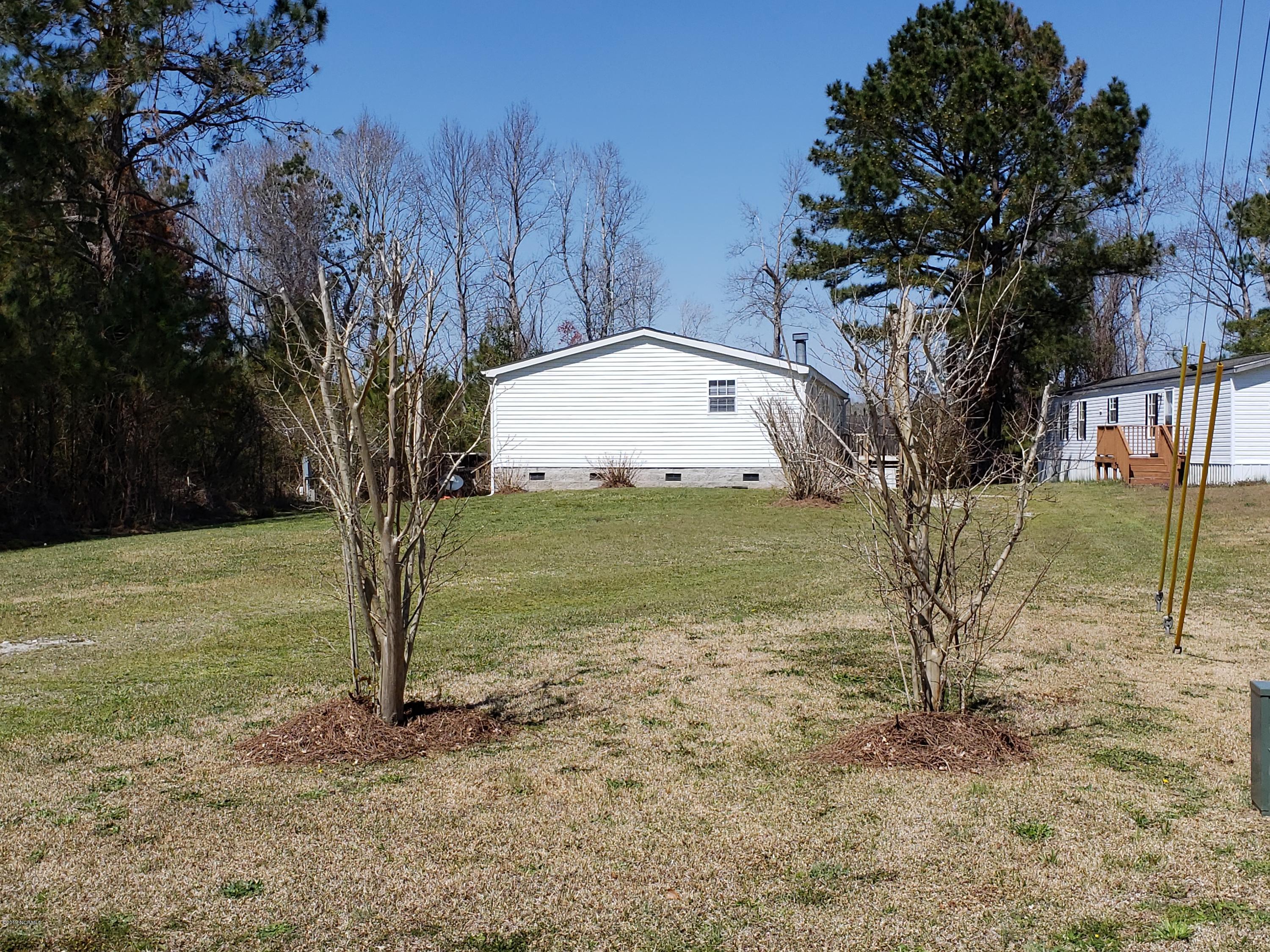 1157 South Parker Road Holly Ridge, NC 28445 - Photo 3 of 57 View from the road.