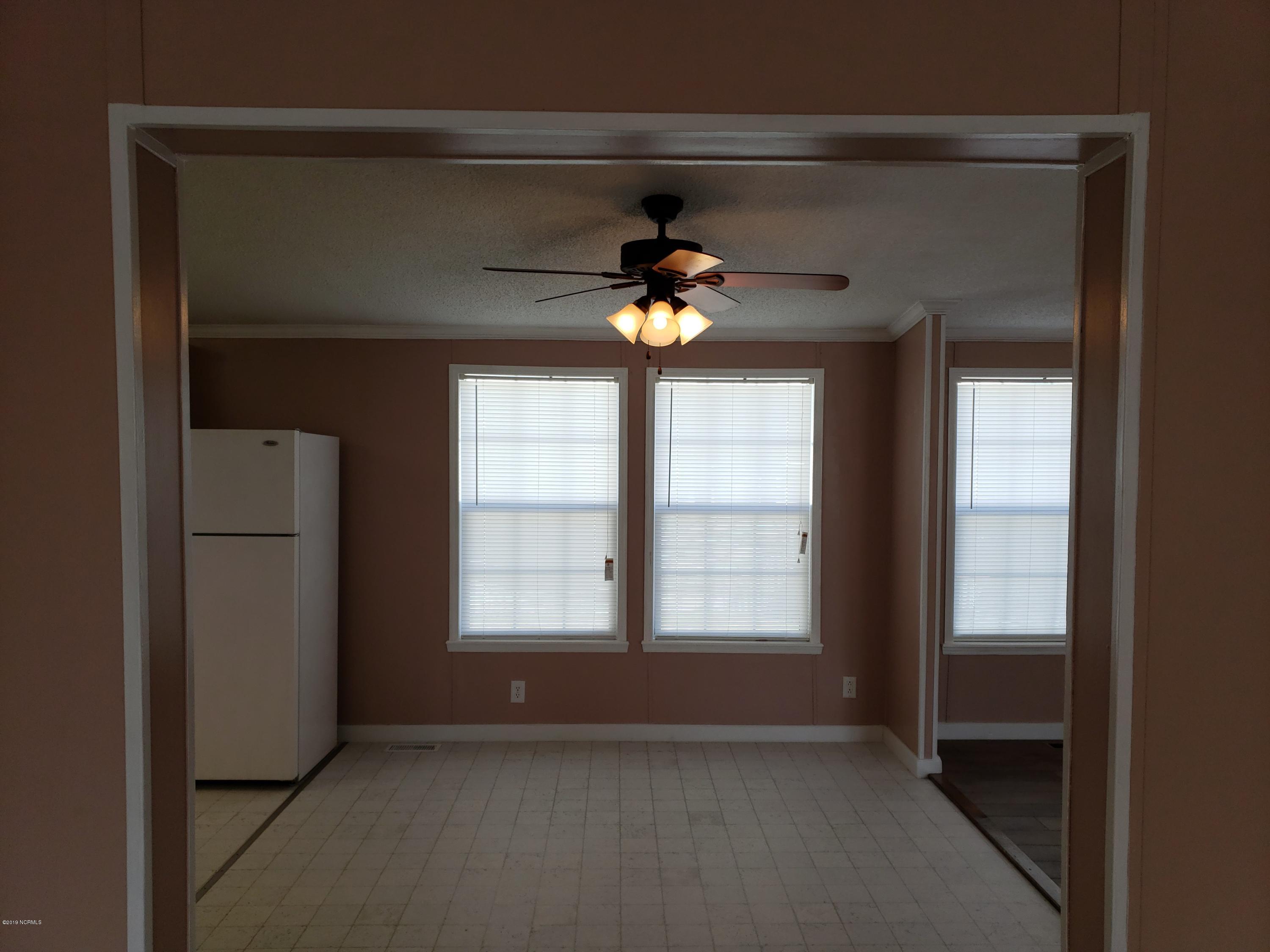 1157 South Parker Road Holly Ridge, NC 28445 - Photo 33 of 57 From Formal Dining / Den / Office looking out to Dining Area.