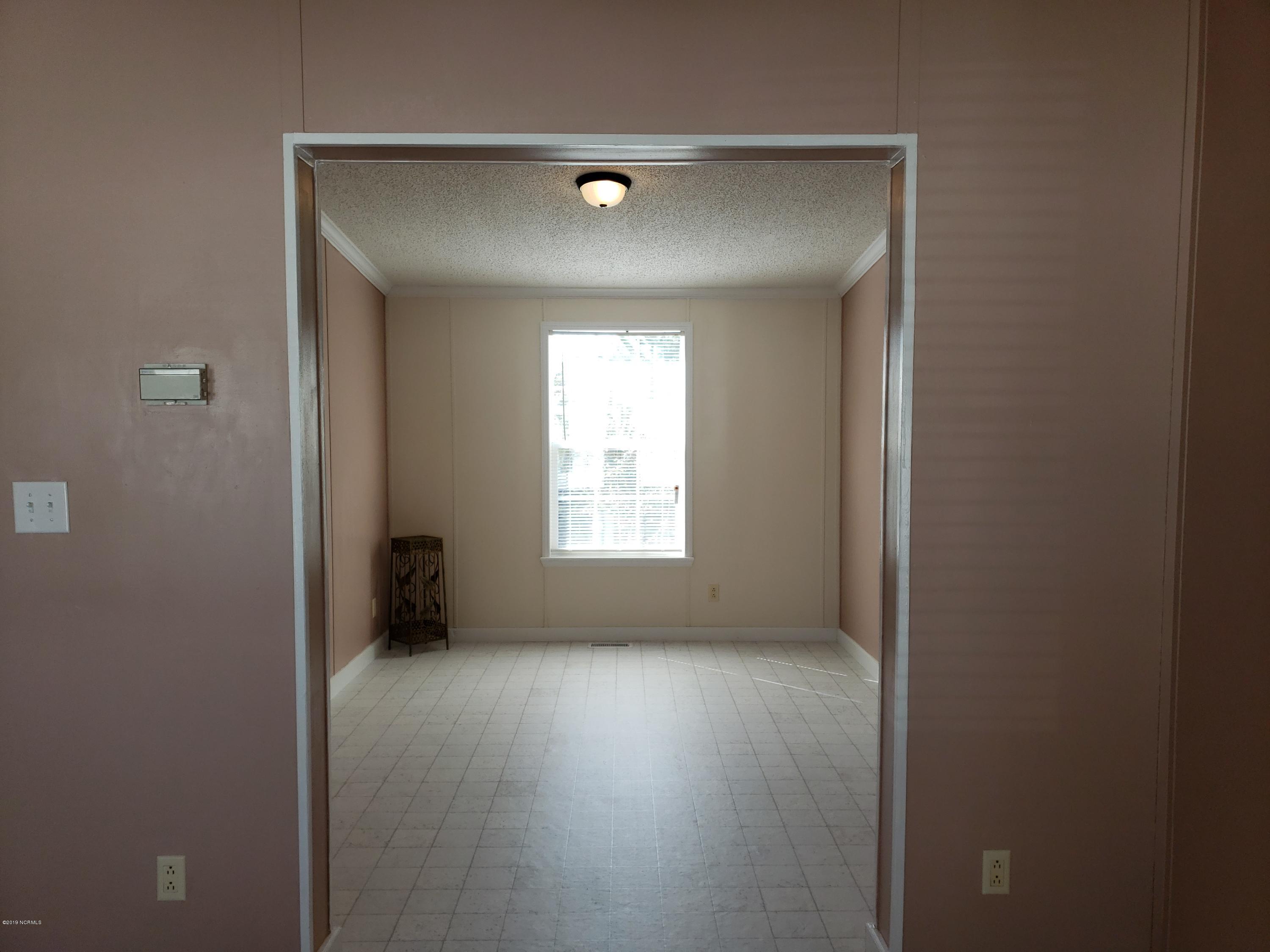 1157 South Parker Road Holly Ridge, NC 28445 - Photo 34 of 57 From Dining Area looking into Formal Dining / Den / Office