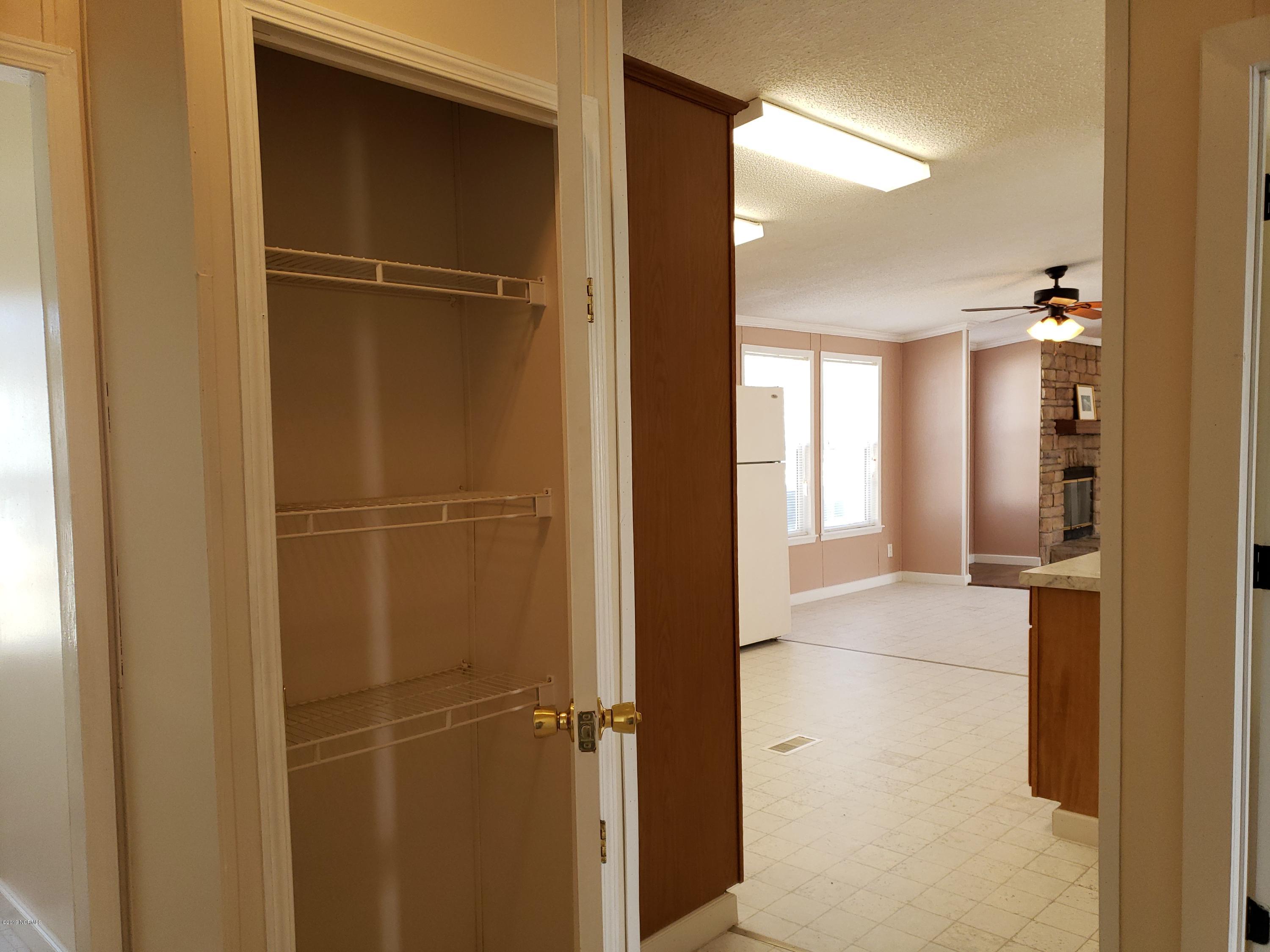 1157 South Parker Road Holly Ridge, NC 28445 - Photo 41 of 57 Linen / Hall Closet across from Hall Bath