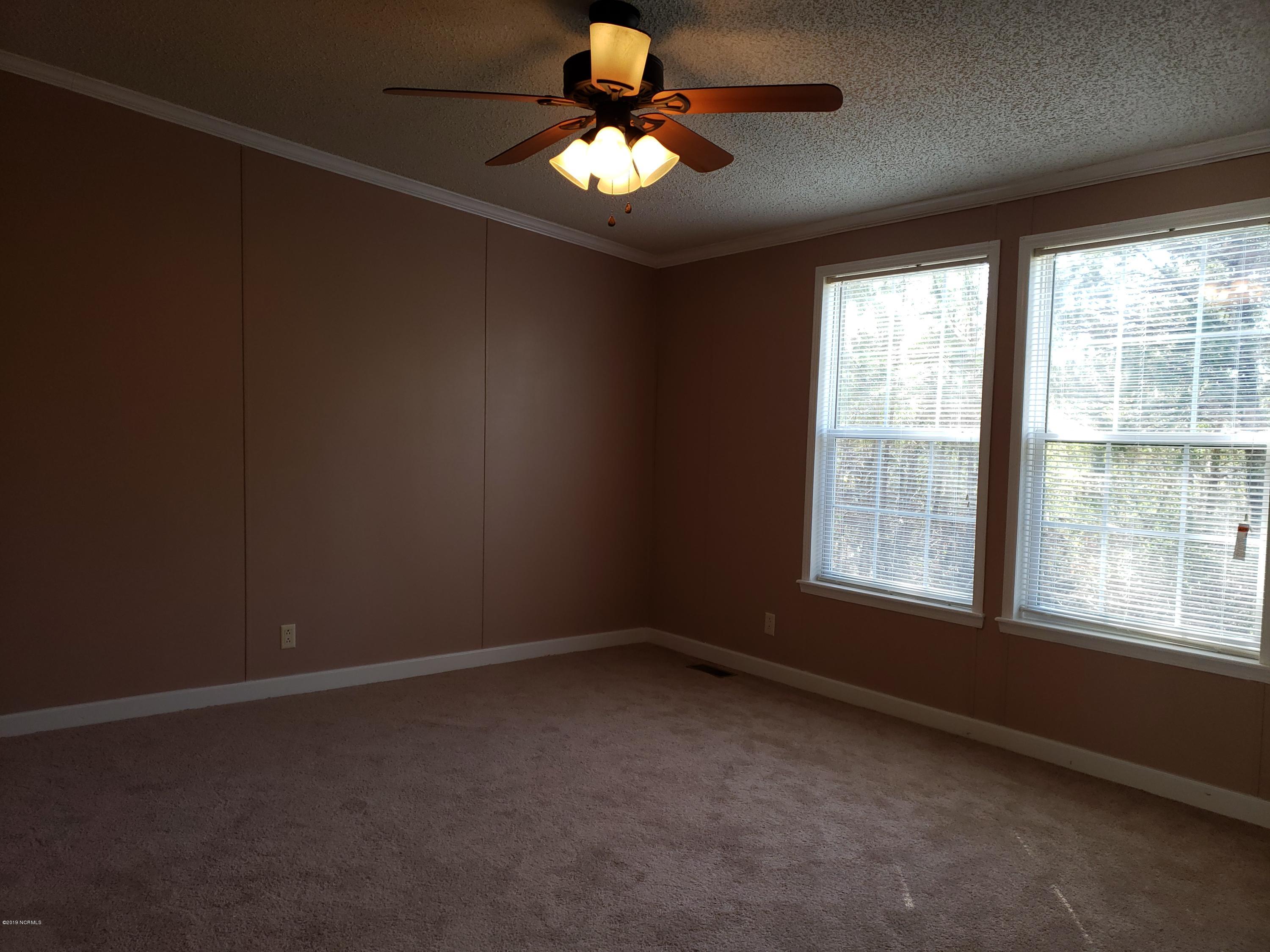 1157 South Parker Road Holly Ridge, NC 28445 - Photo 7 of 57 Master Bedroom