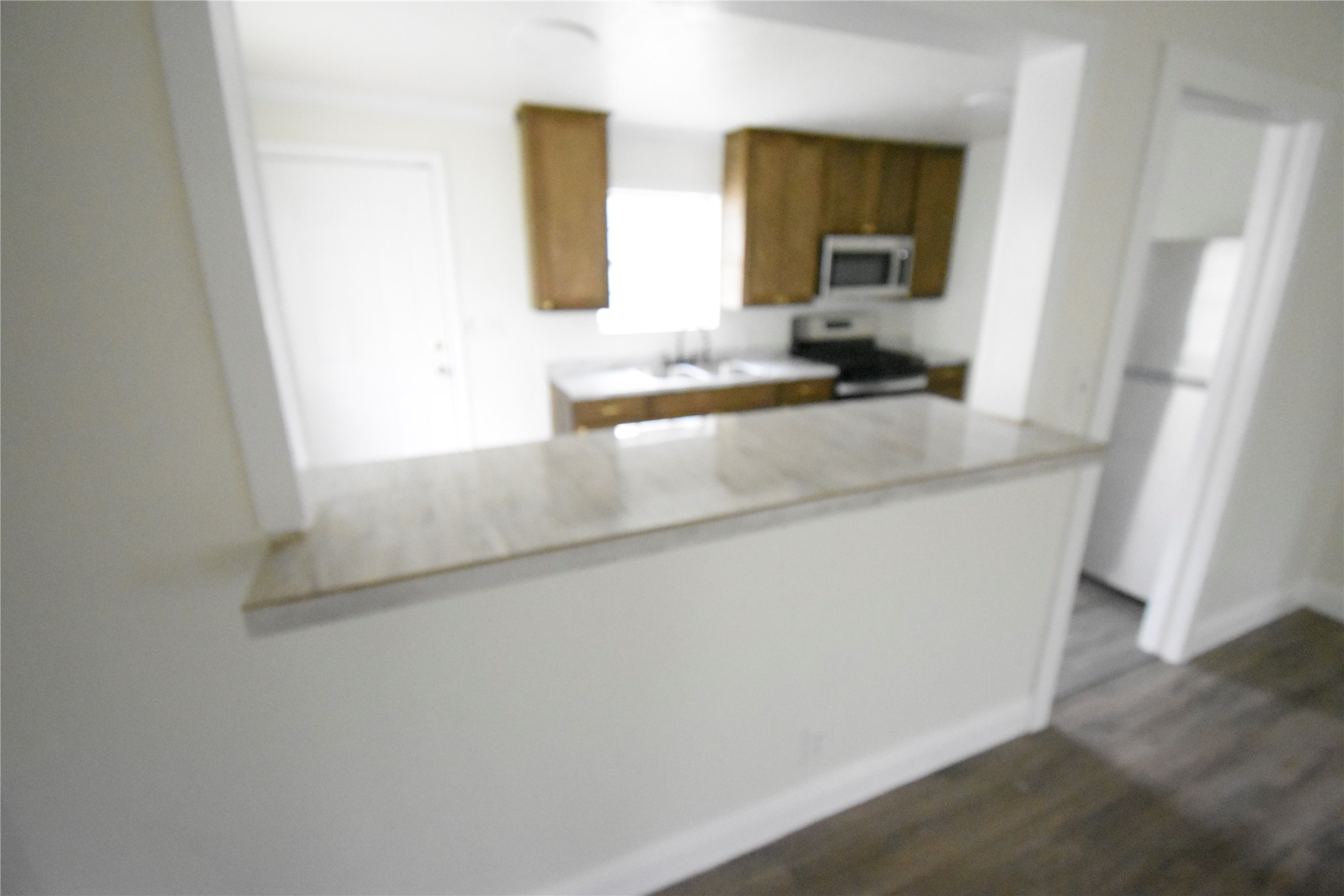 6229 Clover Ridge Street Houston, TX 77087 - Photo 14 of 25 a bathroom with a sink a mirror and a window
