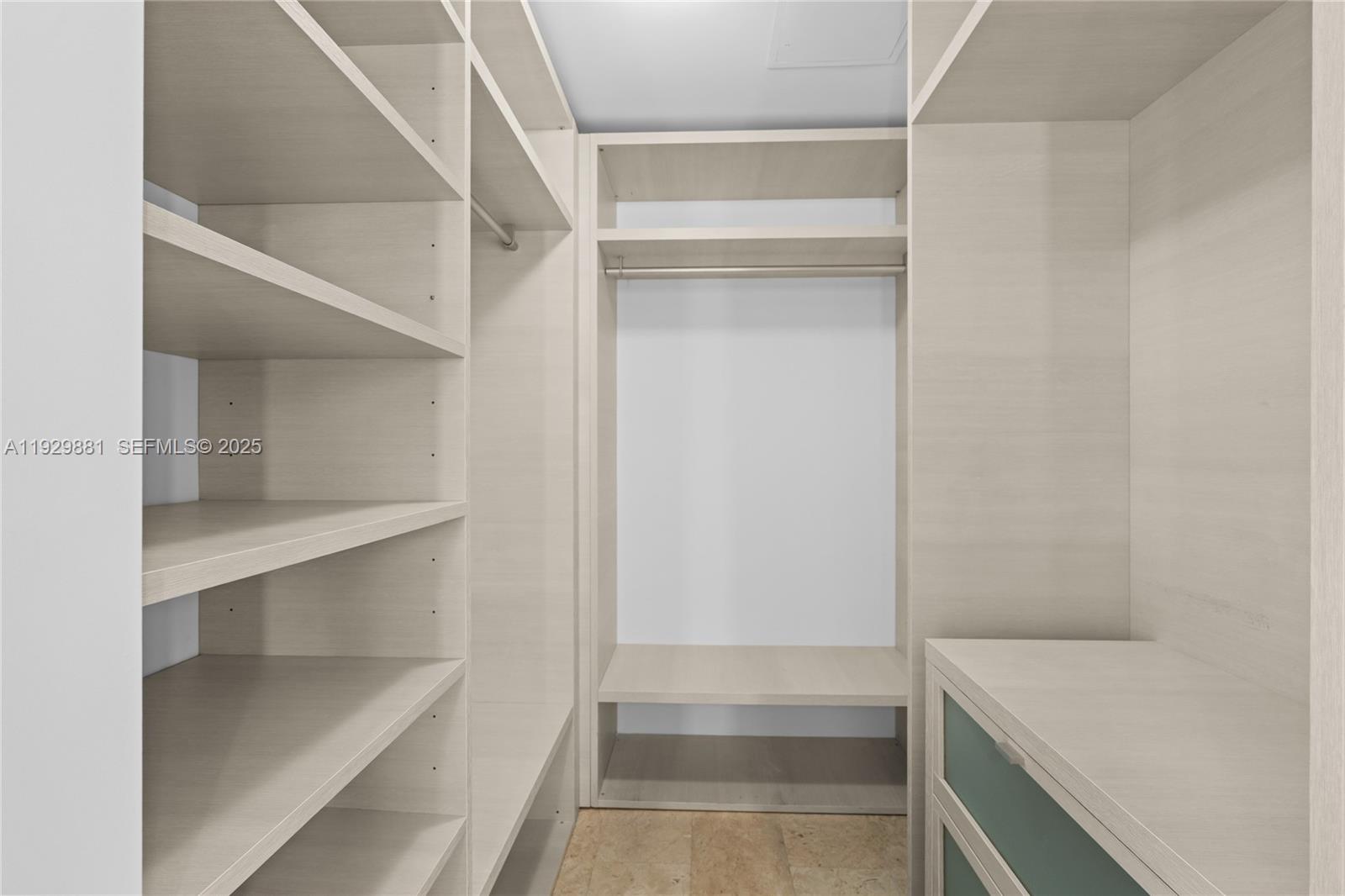 88 Southwest 7th Street, Unit 3608 Miami, FL 33130 - Photo 11 of 36 a view of an empty walk in closet