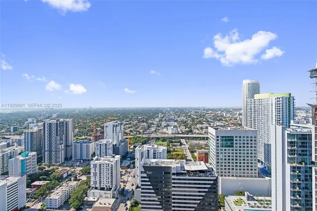 a view of a city with tall buildings