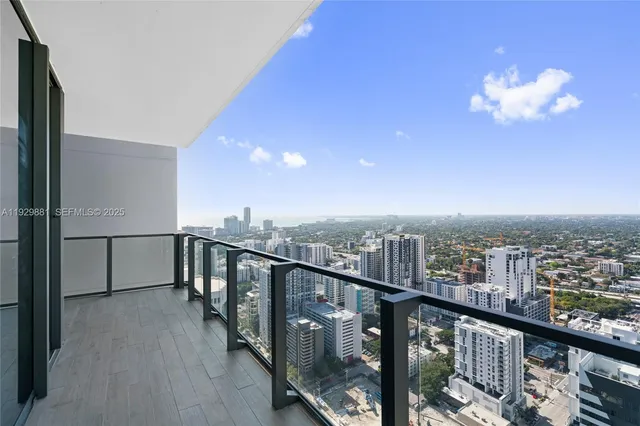 a view of a balcony with city view