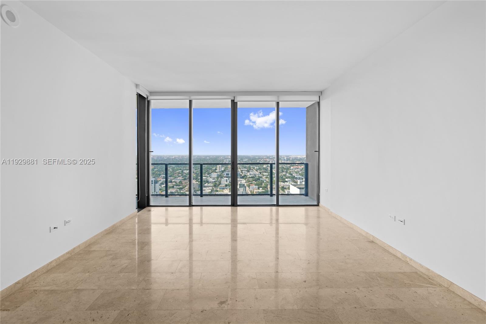 88 Southwest 7th Street, Unit 3608 Miami, FL 33130 - Photo 33 of 36 wooden floor in an empty room with a window