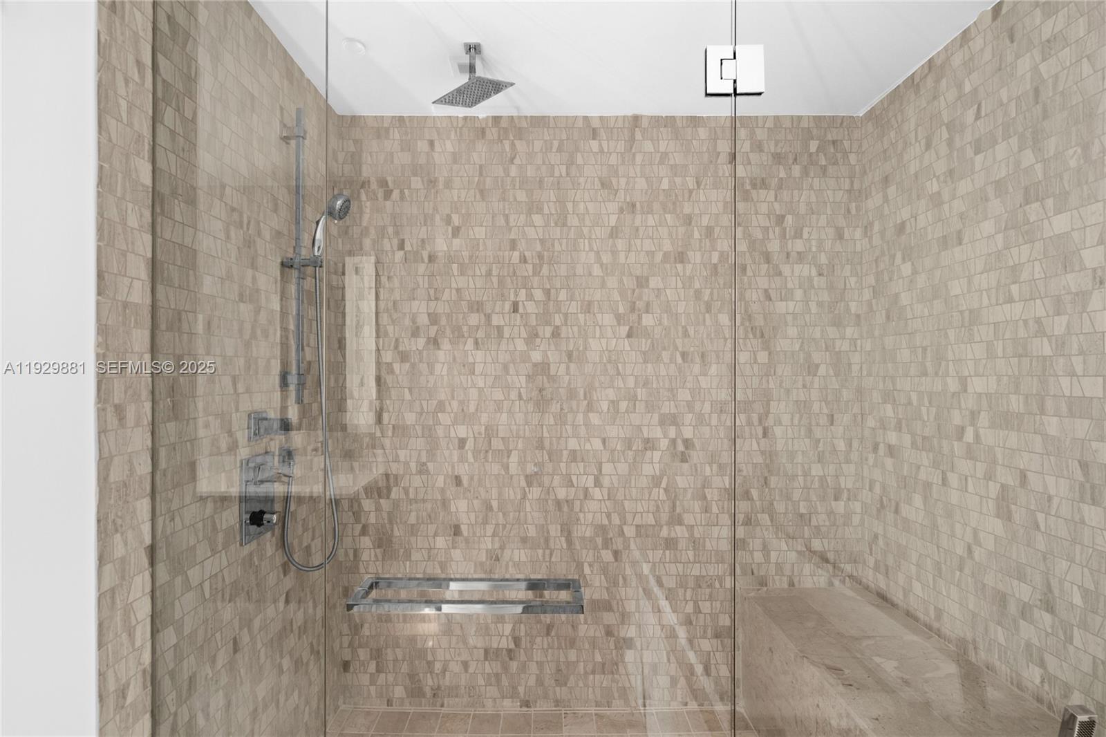 88 Southwest 7th Street, Unit 3608 Miami, FL 33130 - Photo 4 of 36 a bathroom with a shower