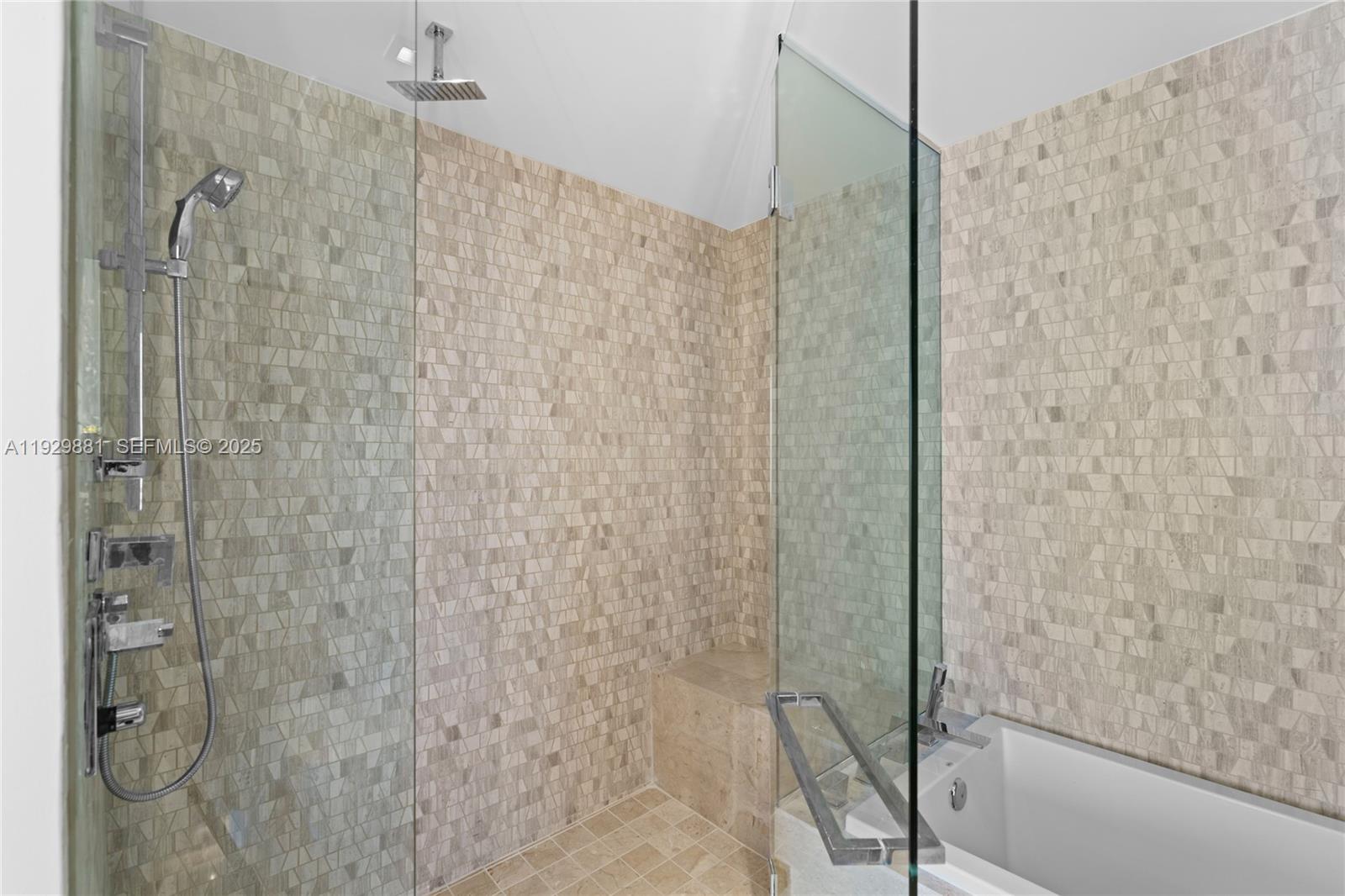 88 Southwest 7th Street, Unit 3608 Miami, FL 33130 - Photo 7 of 36 a bathroom with a shower and a glass door