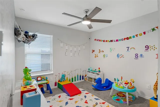 a bed room with lots of baby toys