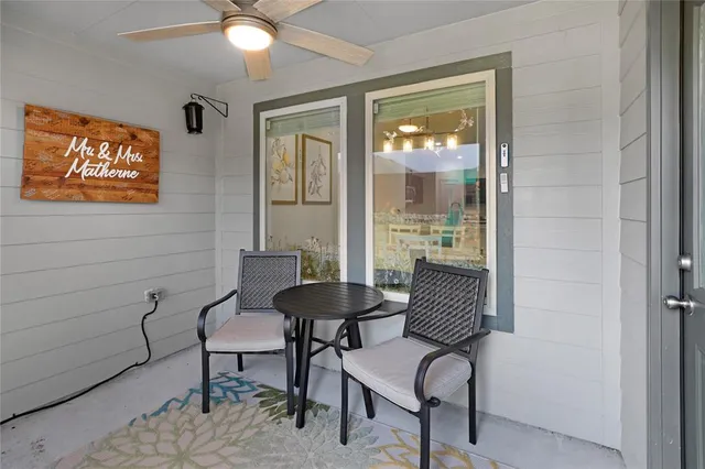 a view of a livingroom with furniture and window