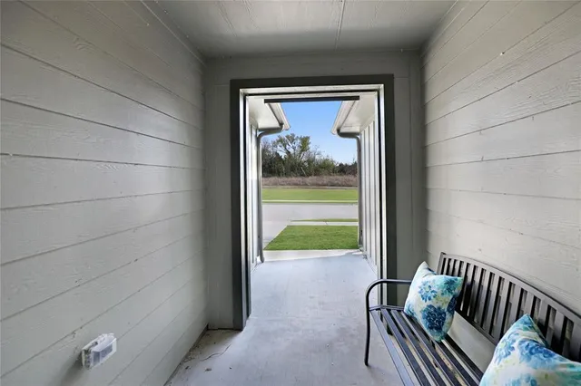 a view of a porch with furniture