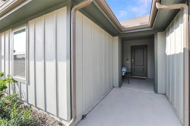 a view of a house with a porch