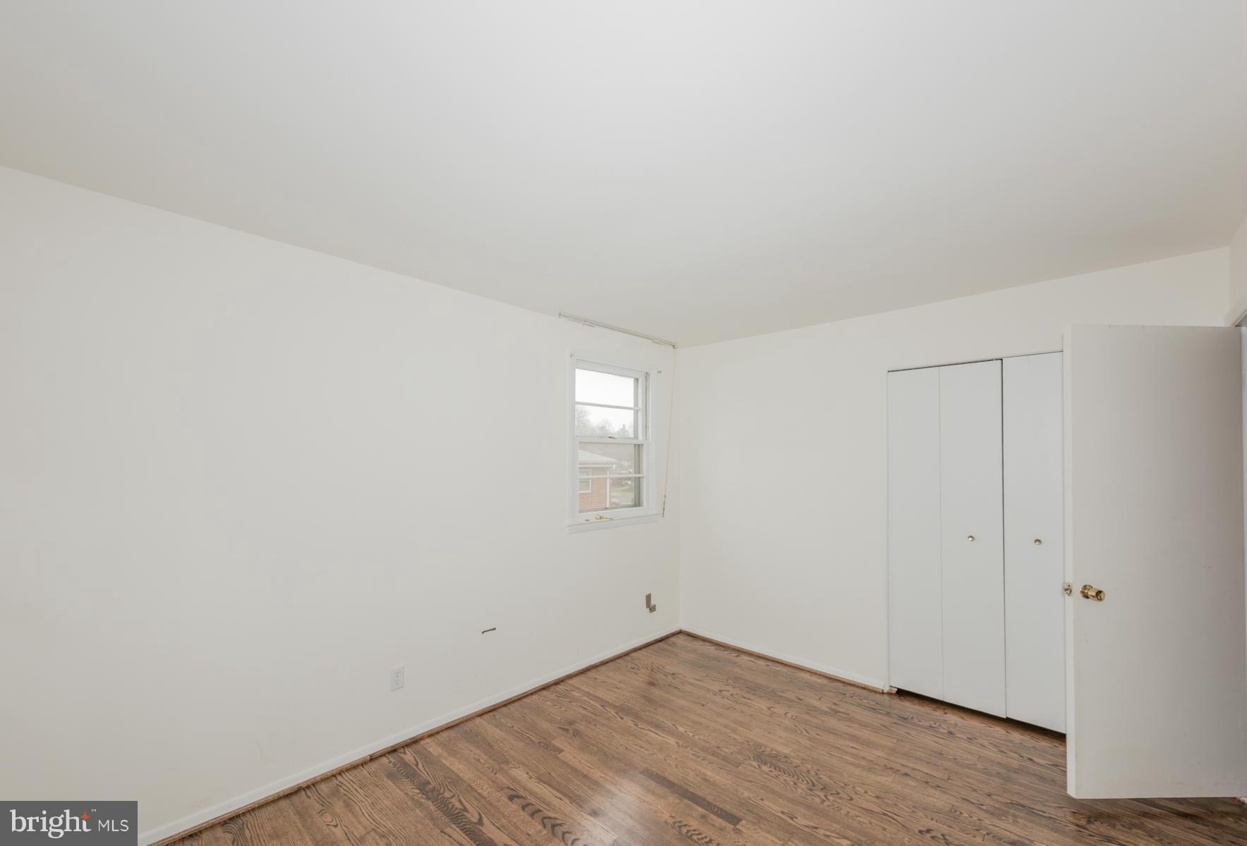 3319 Lauri Road Baltimore, MD 21244 - Photo 18 of 28 a view of an empty room and wooden floor