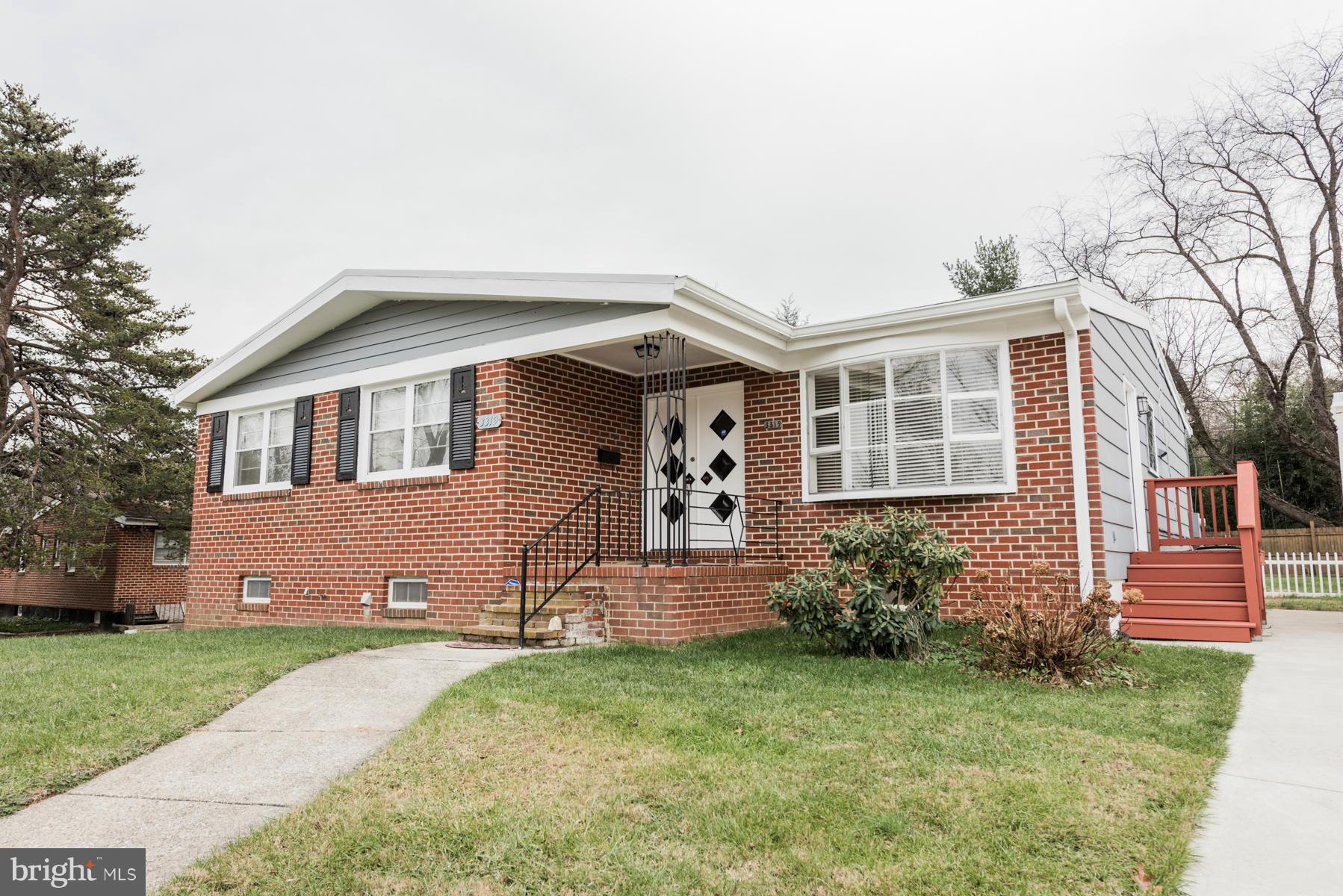 3319 Lauri Road Baltimore, MD 21244 - Photo 24 of 28 a front view of a house with a yard