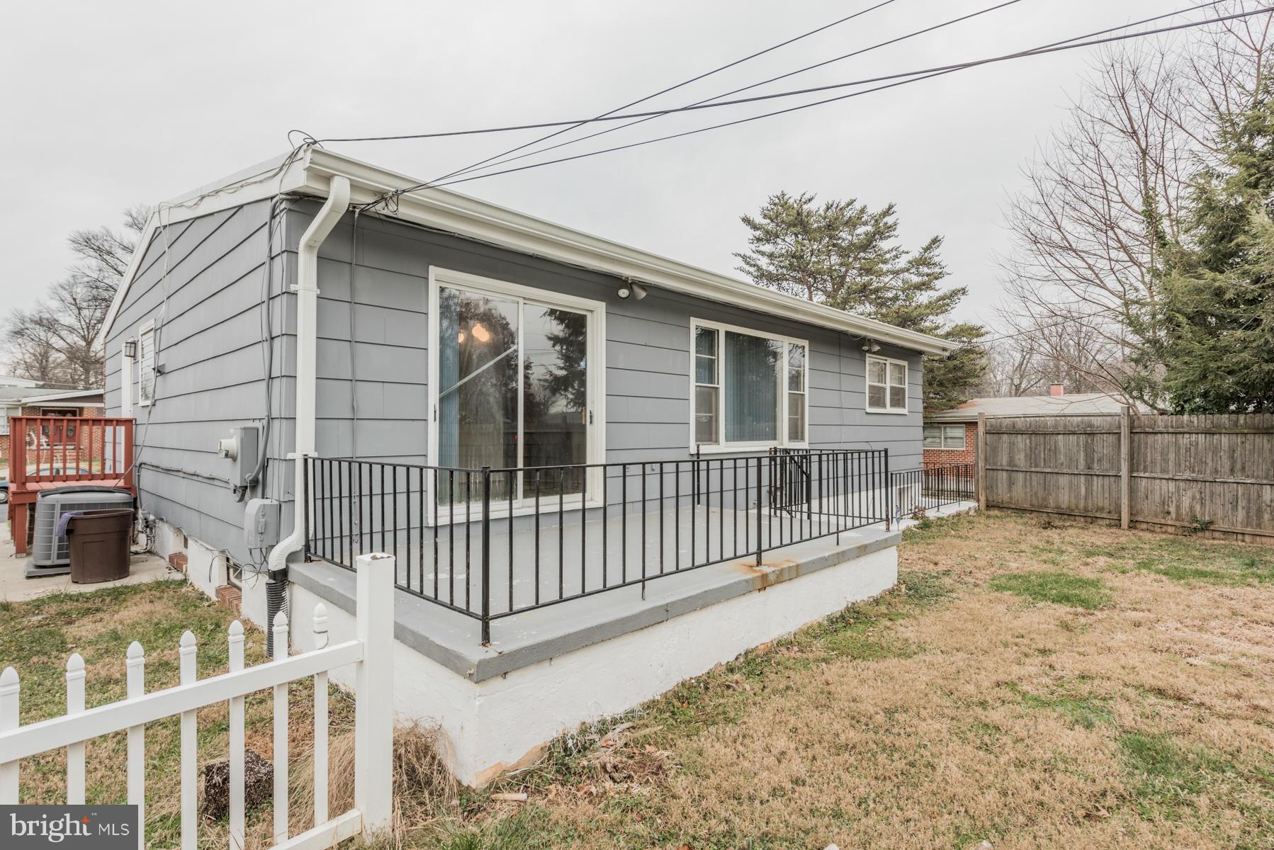 3319 Lauri Road Baltimore, MD 21244 - Photo 28 of 28 a view of a house with a small yard and wooden fence