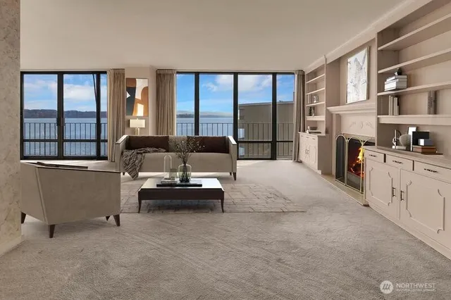 a living room with furniture and a fireplace