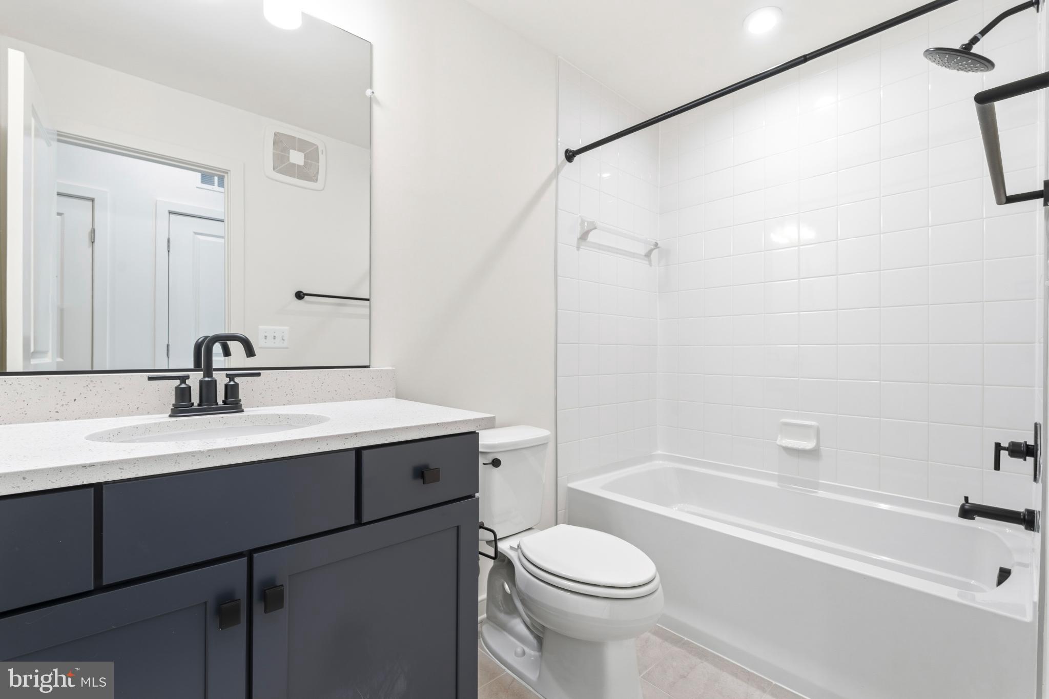 19705 Misty Moss Square Ashburn, VA 20147 - Photo 17 of 25 Modern bathroom with sleek finishes.