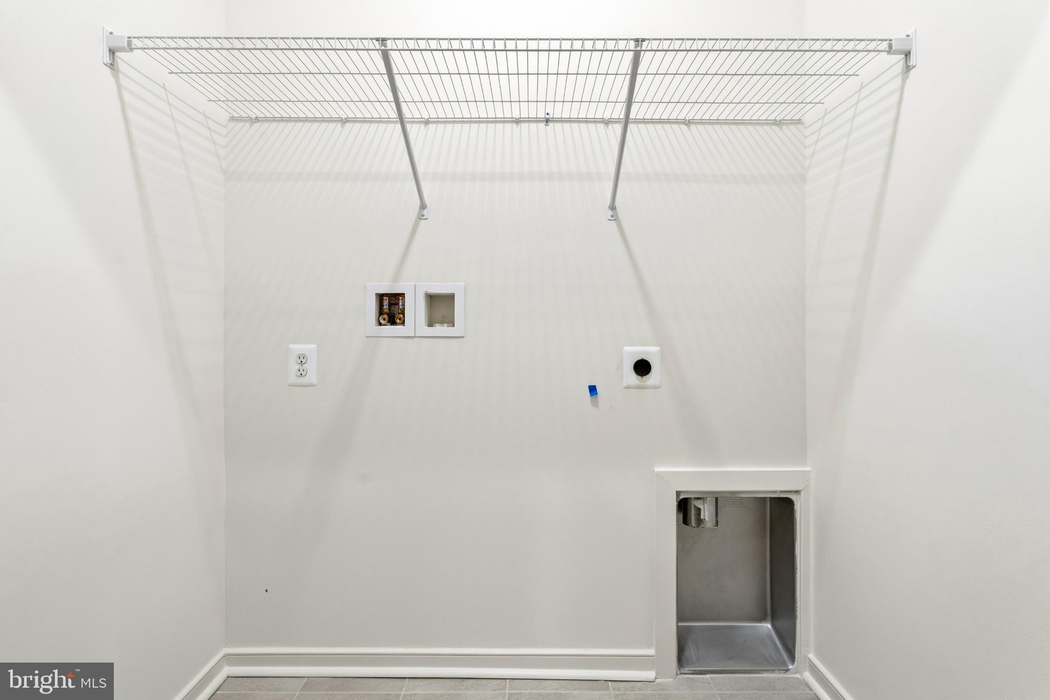 19705 Misty Moss Square Ashburn, VA 20147 - Photo 18 of 25 Spacious laundry area with utility features.