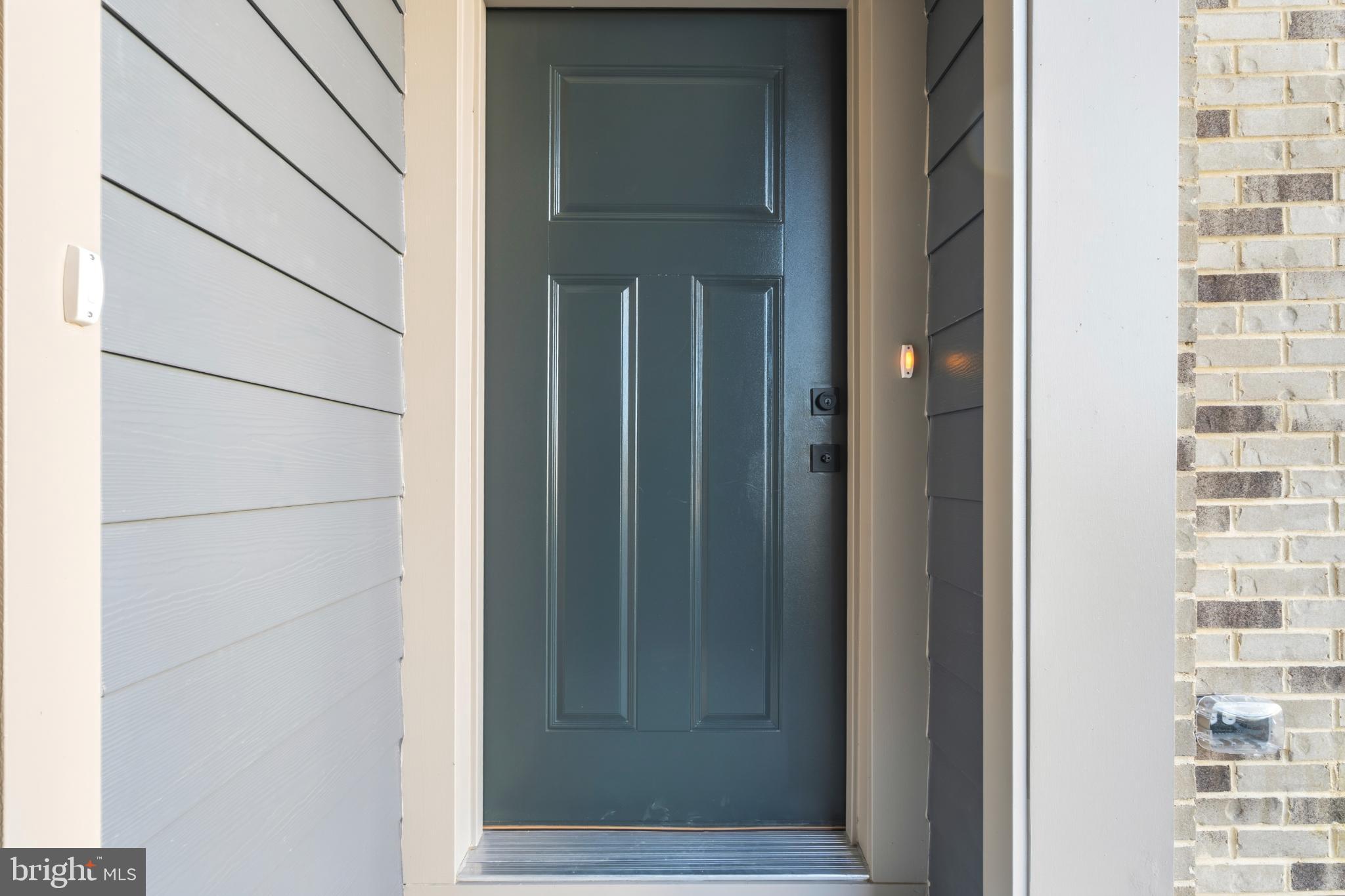 19705 Misty Moss Square Ashburn, VA 20147 - Photo 2 of 25 Inviting entrance with a stylish door.