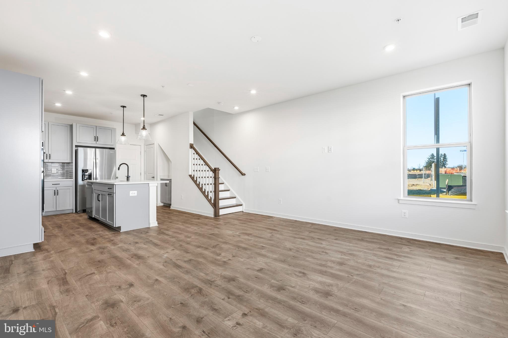 19705 Misty Moss Square Ashburn, VA 20147 - Photo 3 of 25 Spacious modern living with natural light.