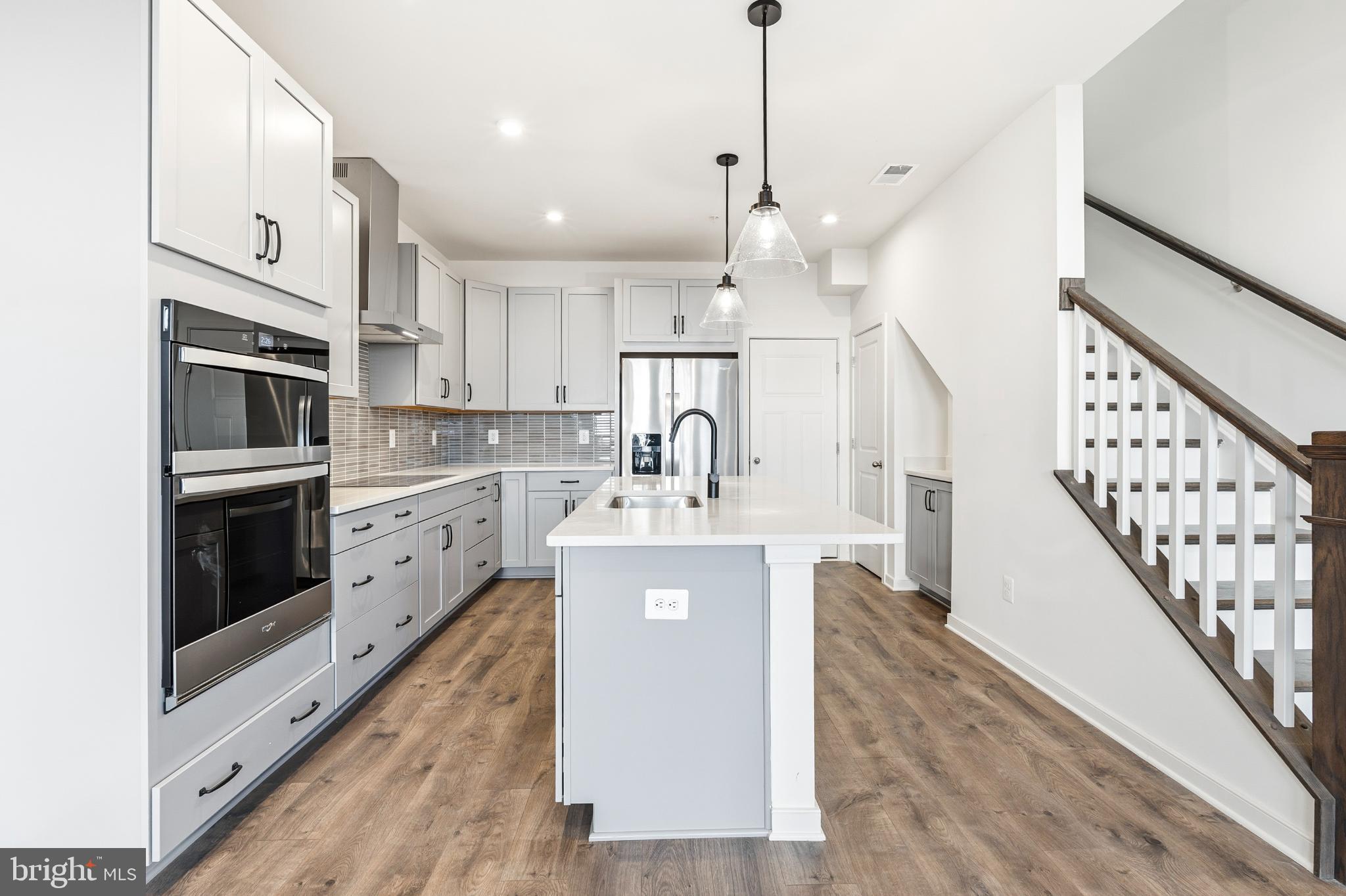 19705 Misty Moss Square Ashburn, VA 20147 - Photo 5 of 25 Modern kitchen with sleek finishes.