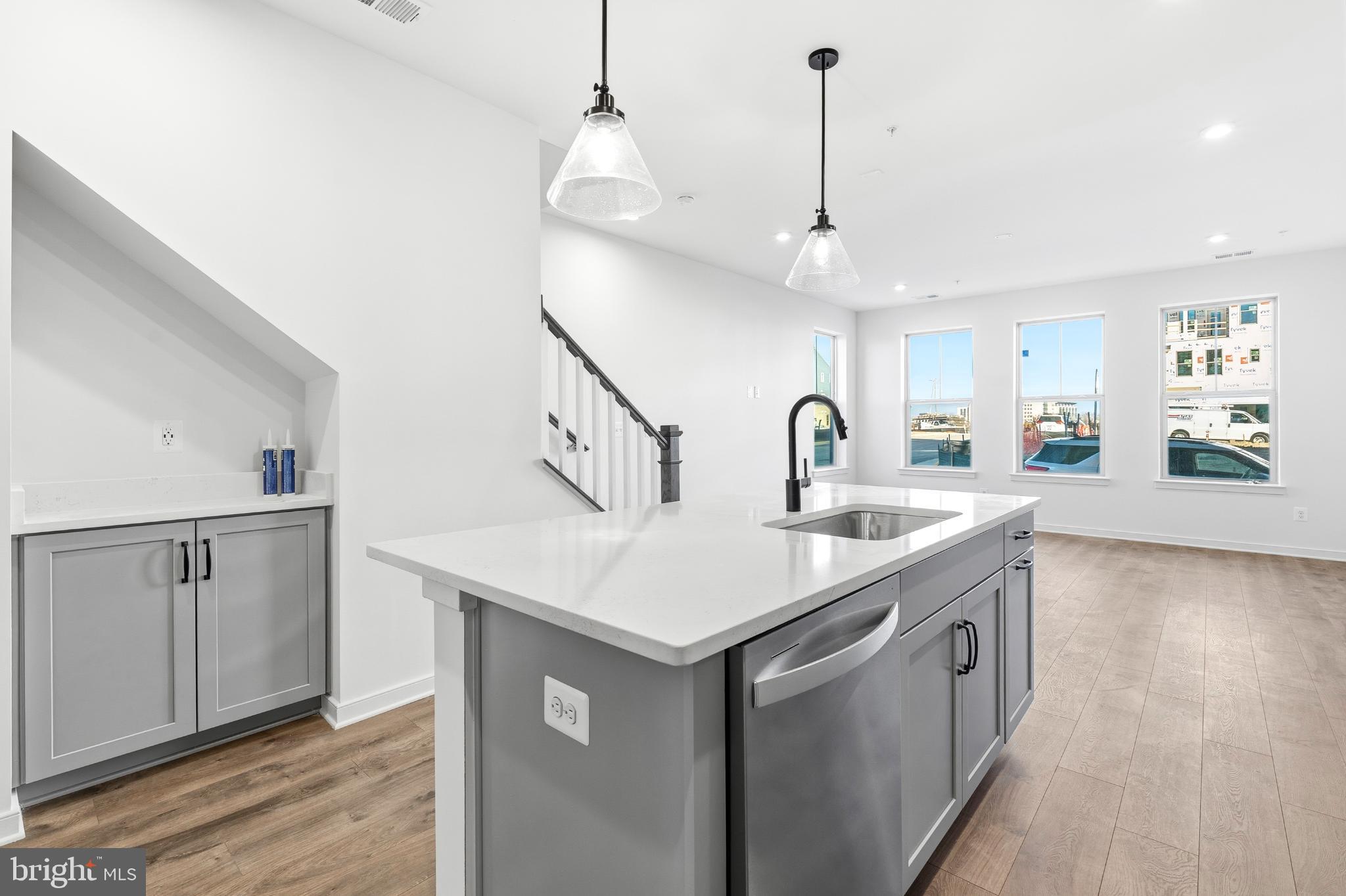 19705 Misty Moss Square Ashburn, VA 20147 - Photo 7 of 25 Modern kitchen with sleek design and light.