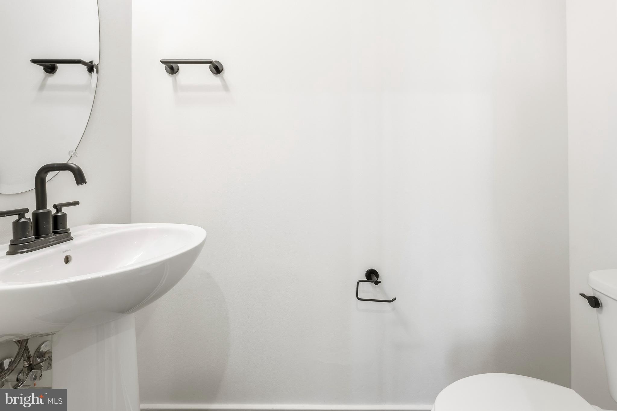 19705 Misty Moss Square Ashburn, VA 20147 - Photo 9 of 25 Sleek and modern bathroom design.