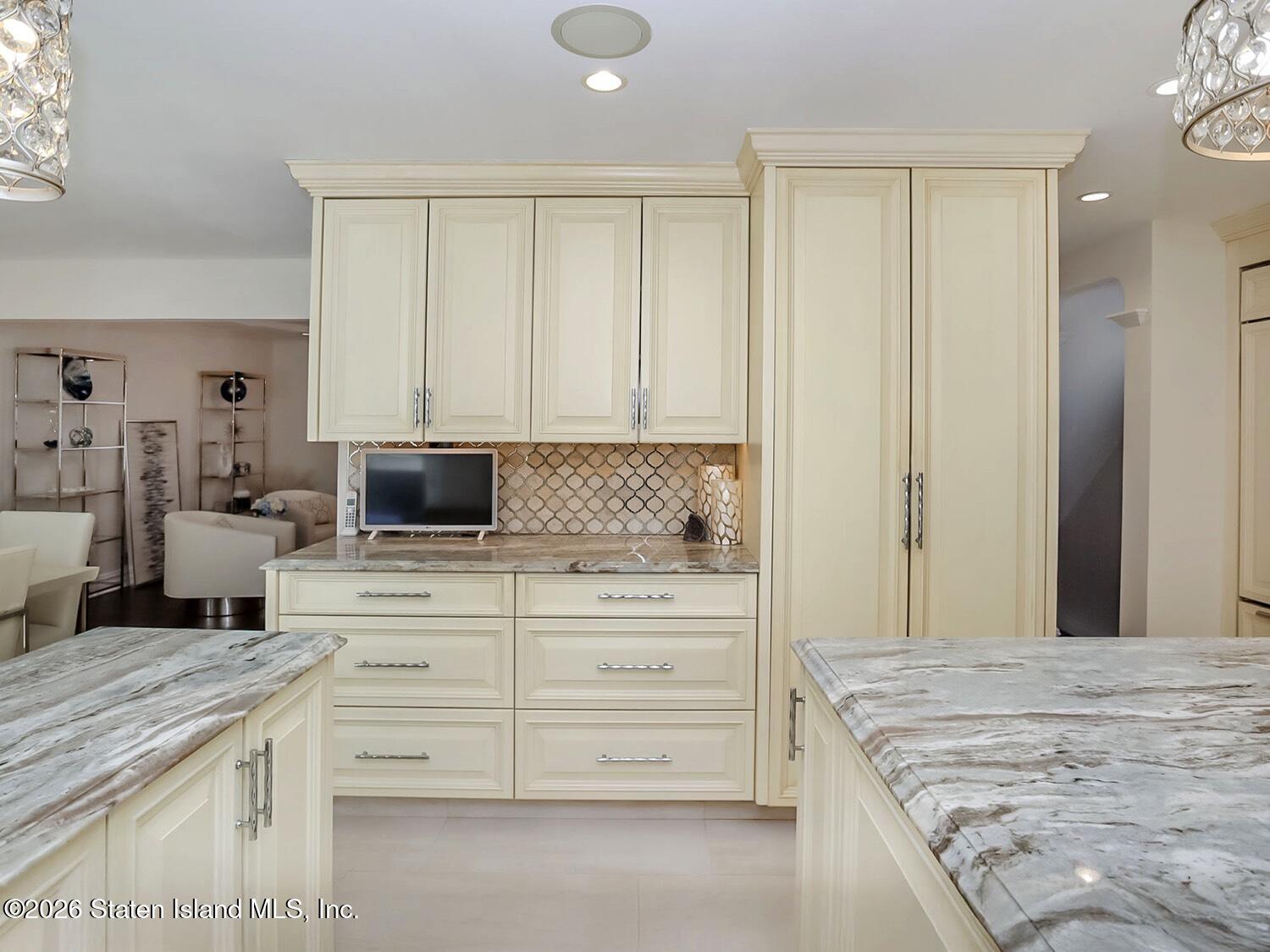 160 Wolverine Street Staten Island, NY 10306 - Photo 15 of 51 a spacious bedroom with a large bed and a dresser