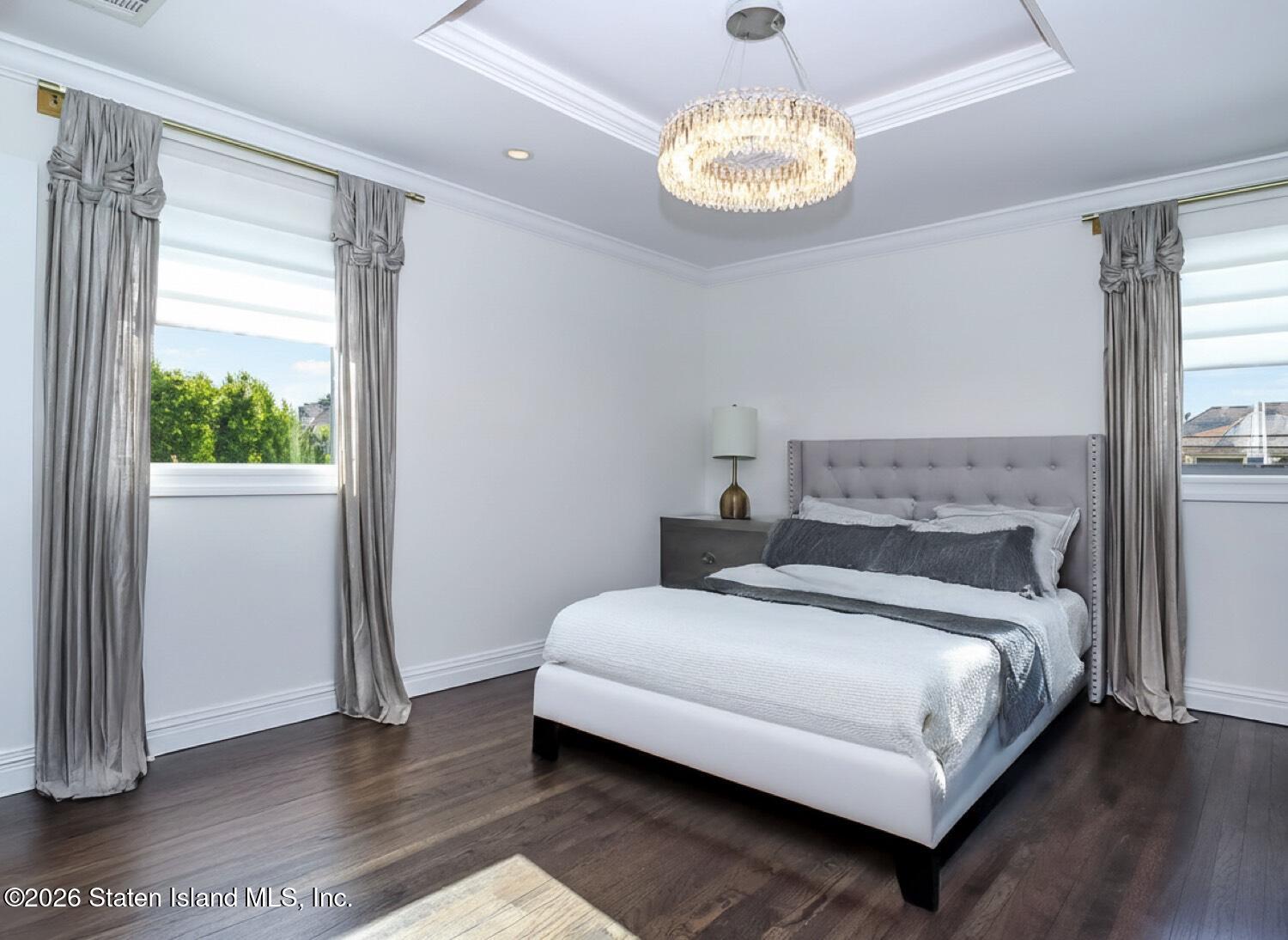 160 Wolverine Street Staten Island, NY 10306 - Photo 22 of 51 a bedroom with a bed and a window
