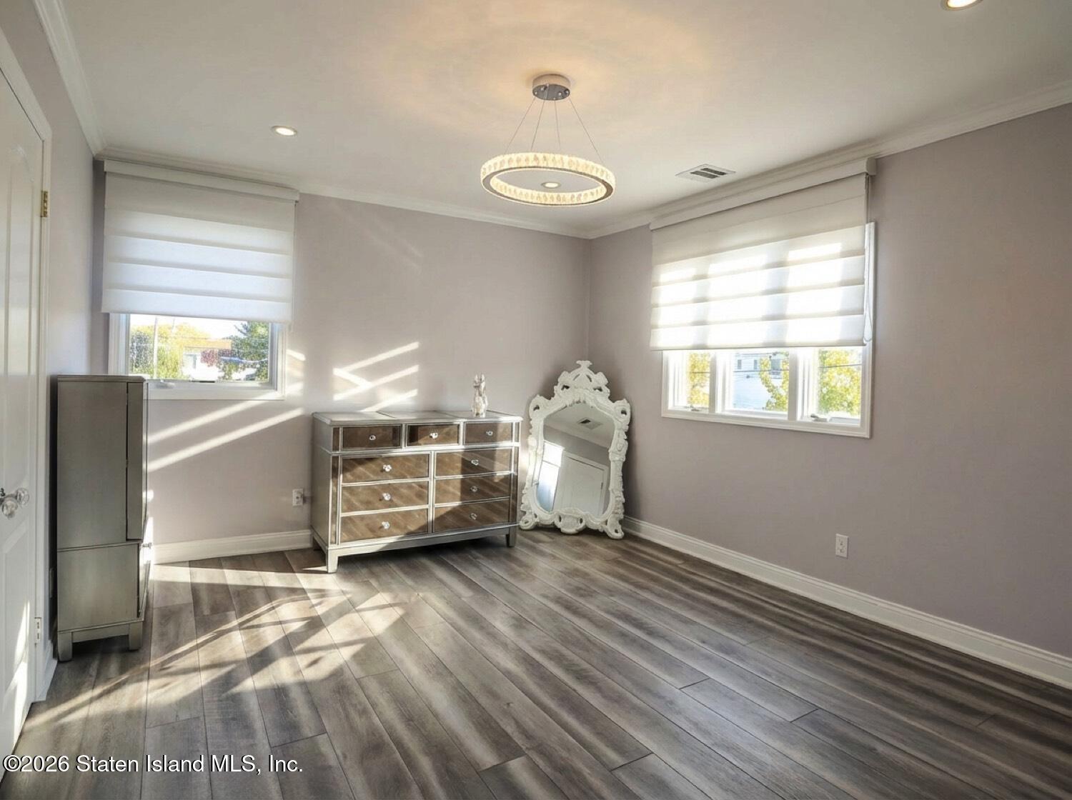 160 Wolverine Street Staten Island, NY 10306 - Photo 26 of 51 a bedroom with a bed and a window