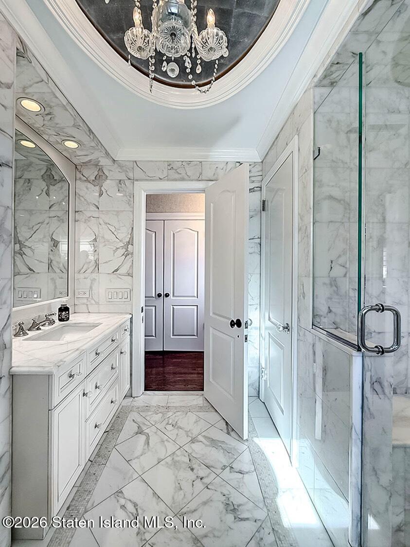 160 Wolverine Street Staten Island, NY 10306 - Photo 30 of 51 a spacious bathroom with a sink a mirror and a shower