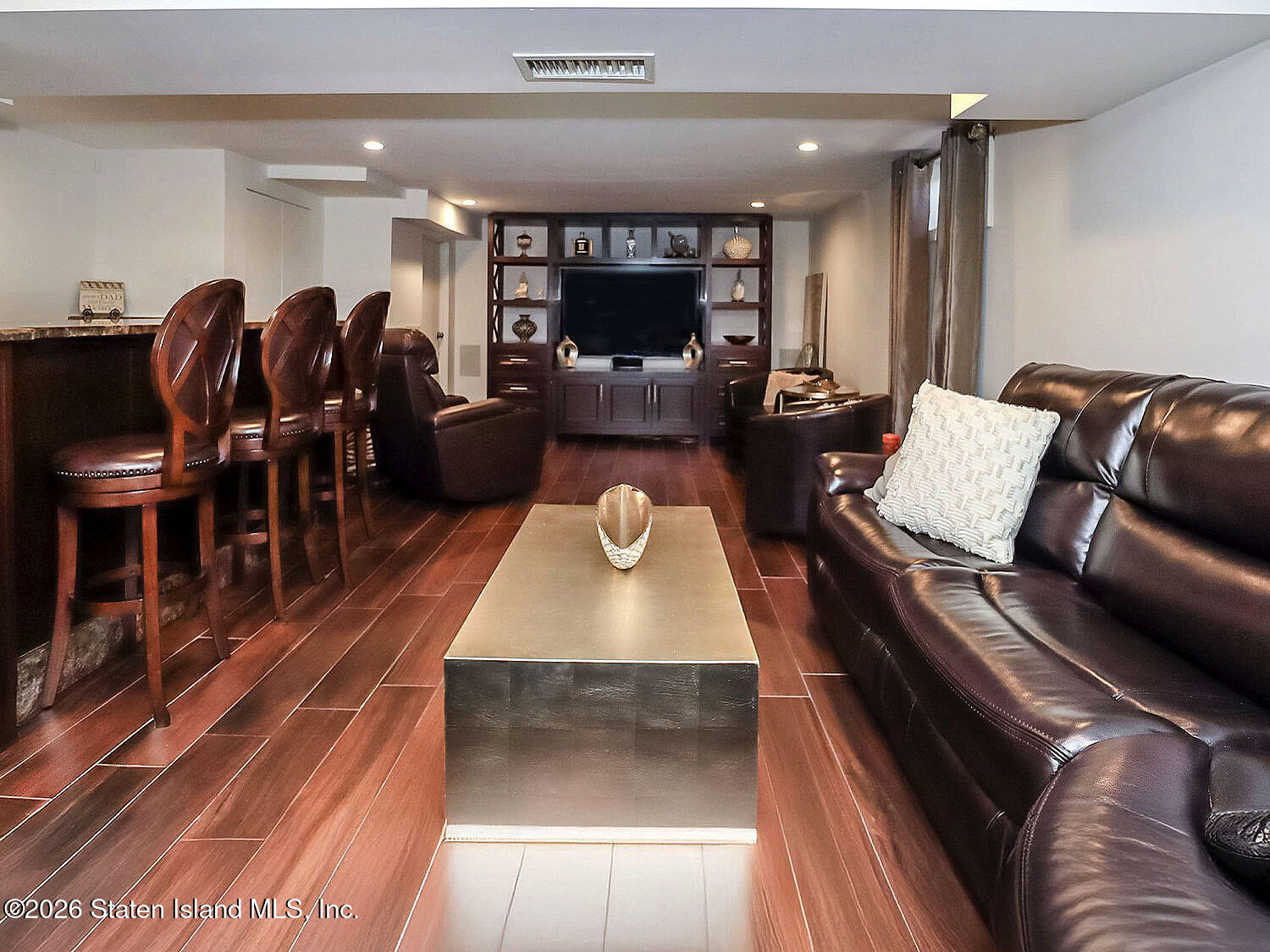 160 Wolverine Street Staten Island, NY 10306 - Photo 37 of 51 a living room with furniture and wooden floor