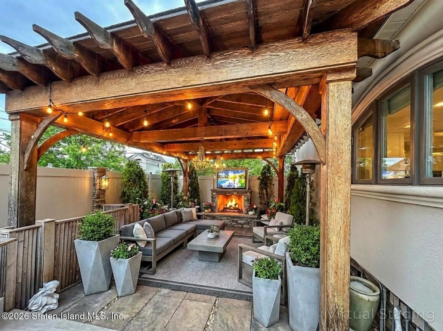 160 Wolverine Street Staten Island, NY 10306 - Photo 44 of 51 a view of a patio with couches and potted plants