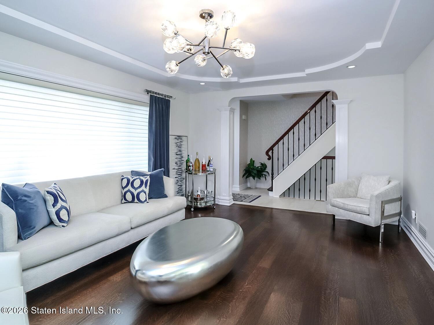160 Wolverine Street Staten Island, NY 10306 - Photo 6 of 51 a living room with furniture and a wooden floor
