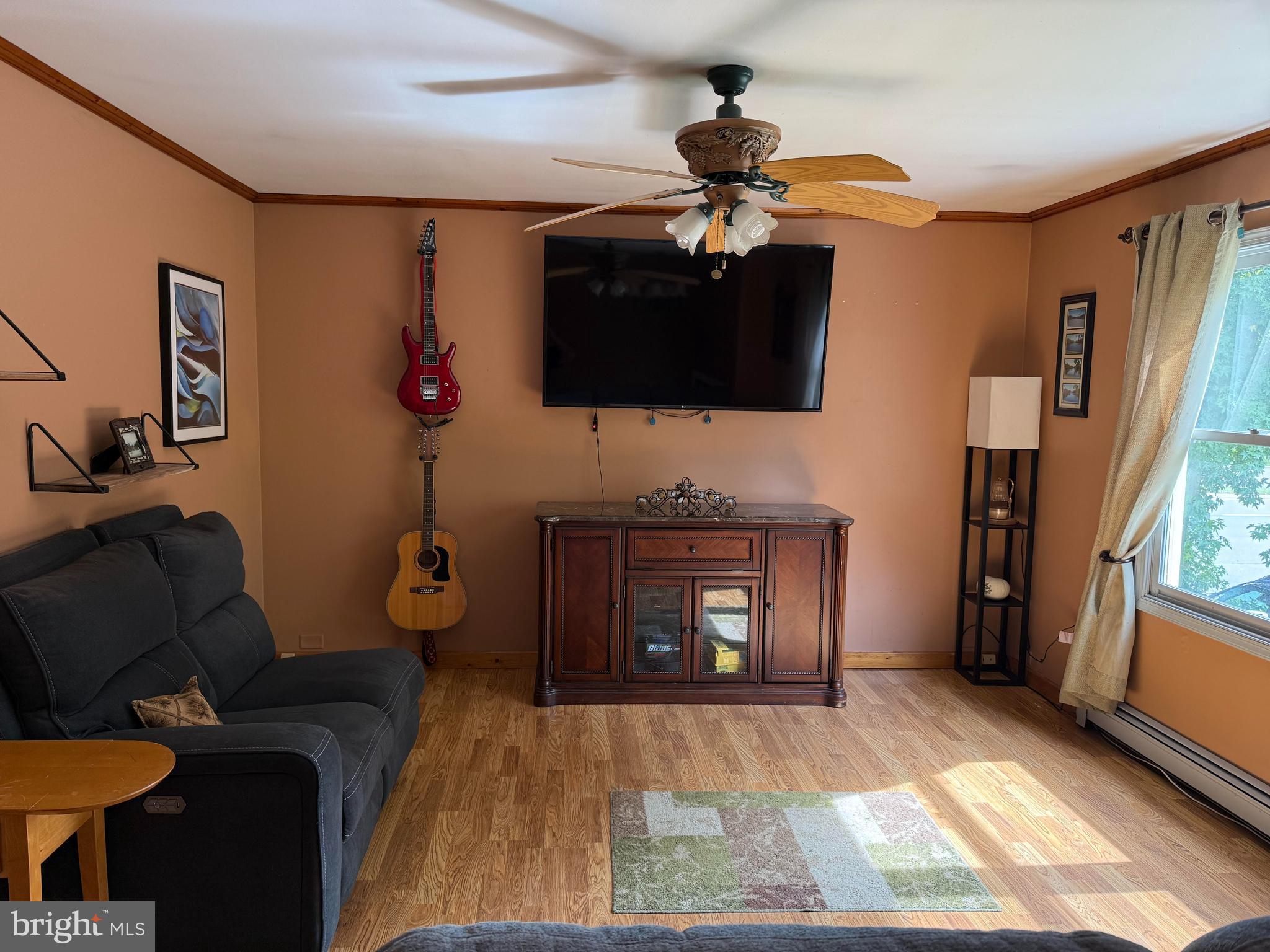 1 Glen Road Bordentown, NJ 08505 - Photo 11 of 17 a living room with furniture and a flat screen tv