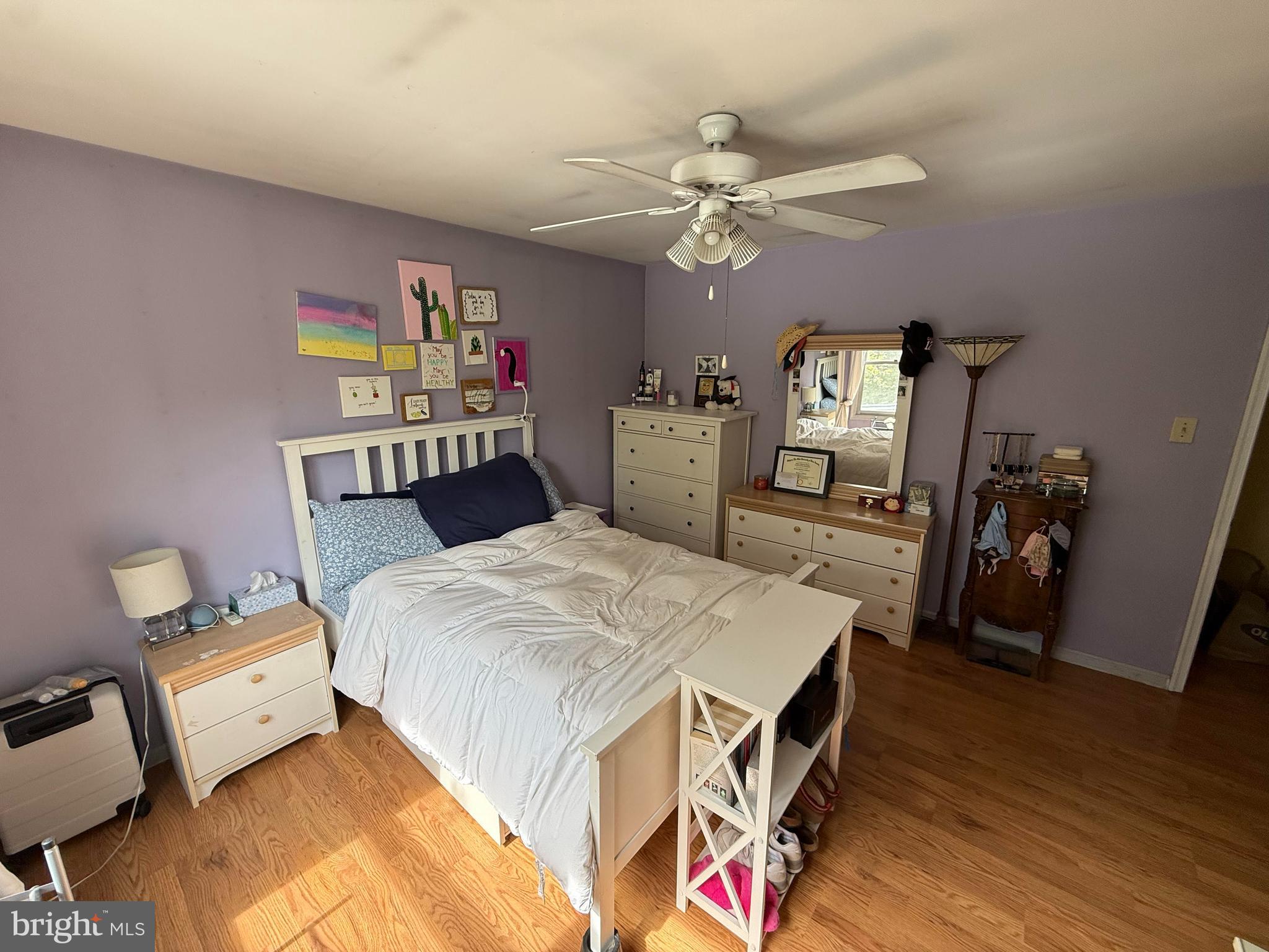 1 Glen Road Bordentown, NJ 08505 - Photo 9 of 17 a bedroom with a bed and a chandelier