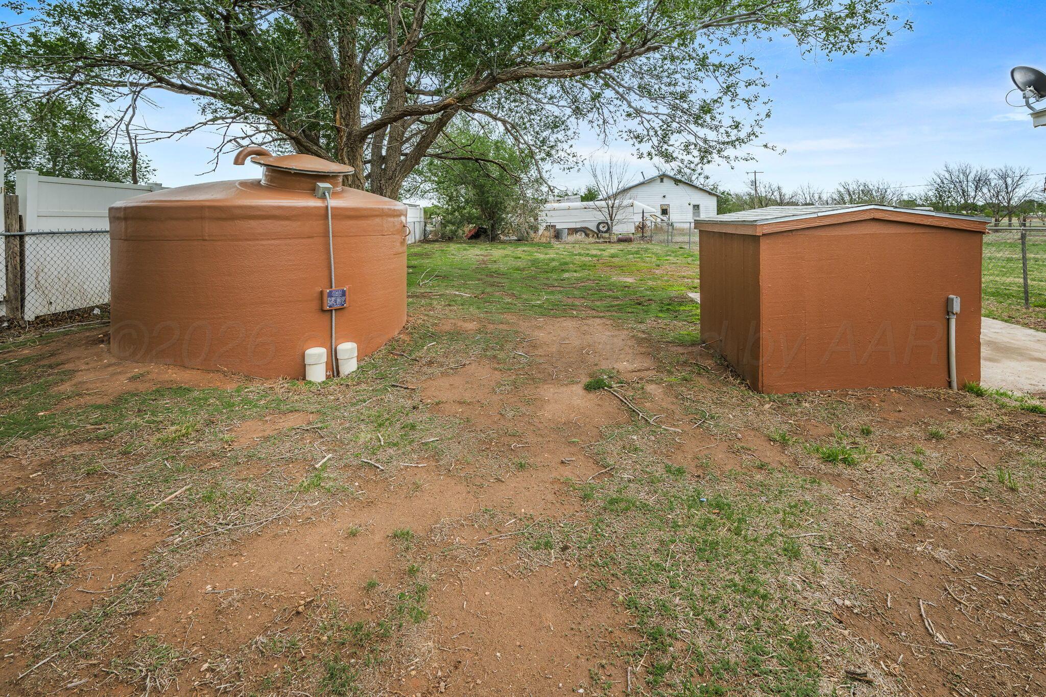 911 West 3rd Street Canyon, TX 79015 - Photo 18 of 18 Well House and Storage Tank