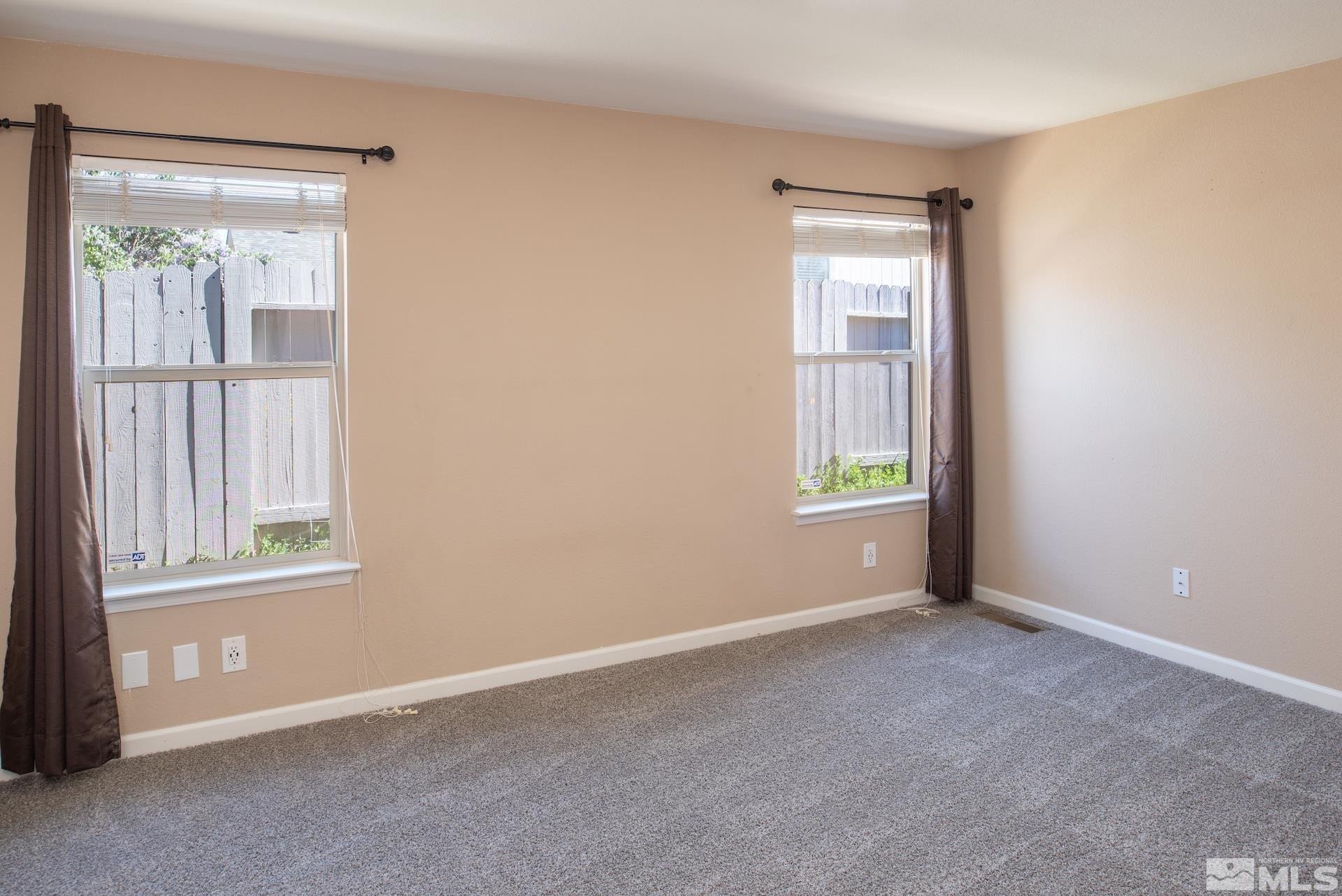 923 Ranchview Circle Carson City, NV 89705 - Photo 15 of 27 a view of an empty room with a window
